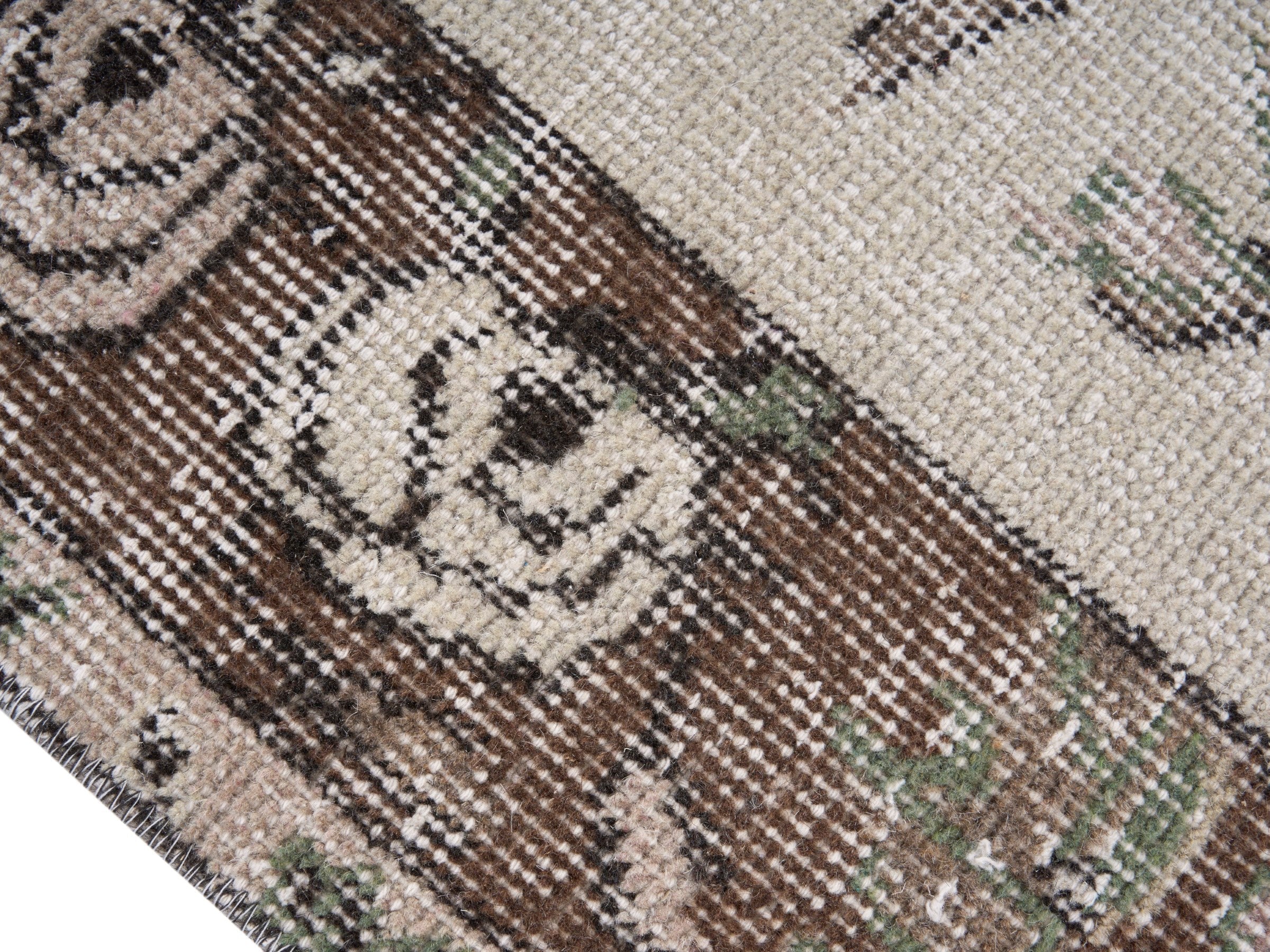 Turkish Isparta area rug in cream and muted pink, view 6 of 10
