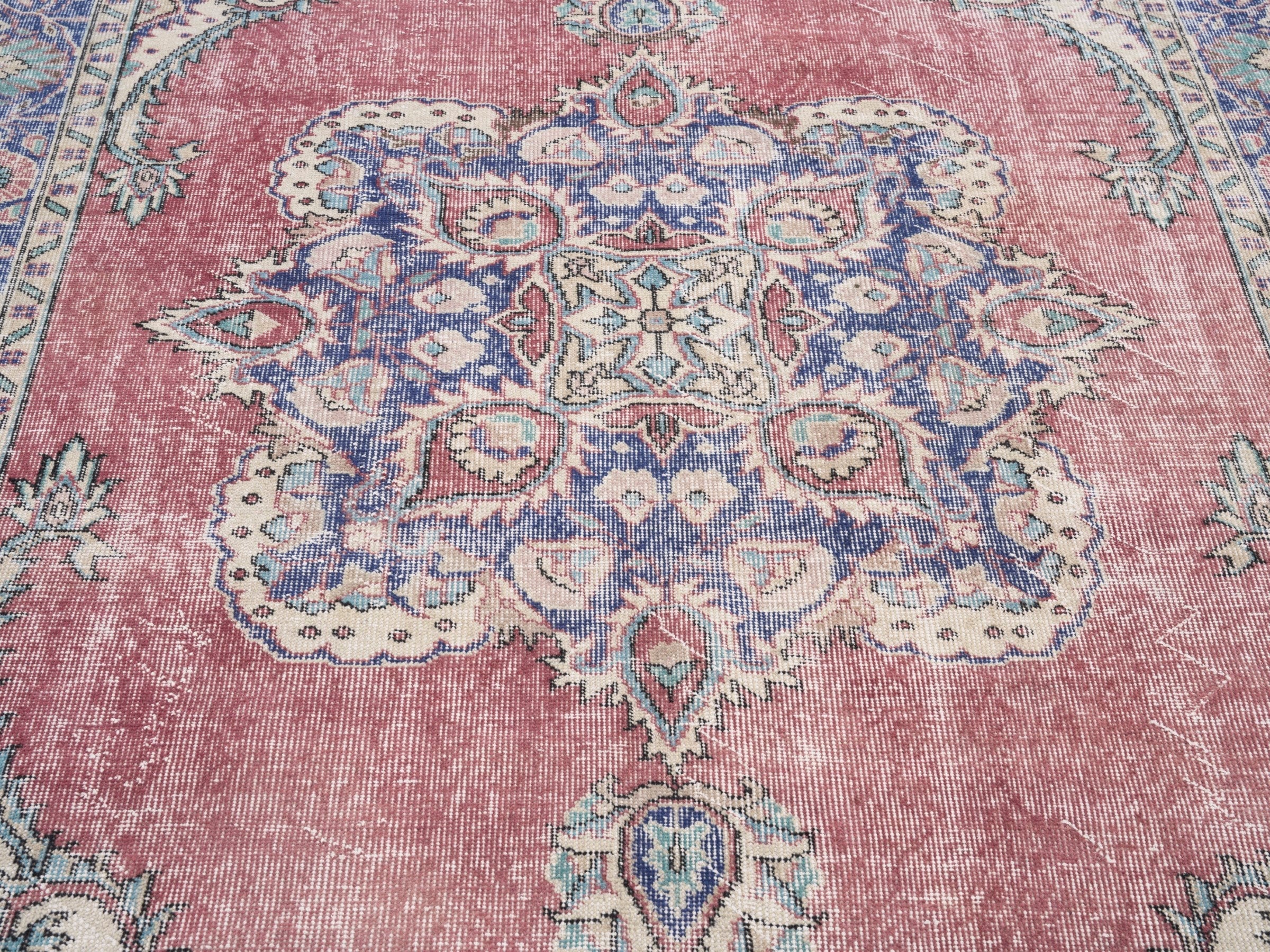 Turkish Isparta area rug in dusty rose and navy, view 4 of 10