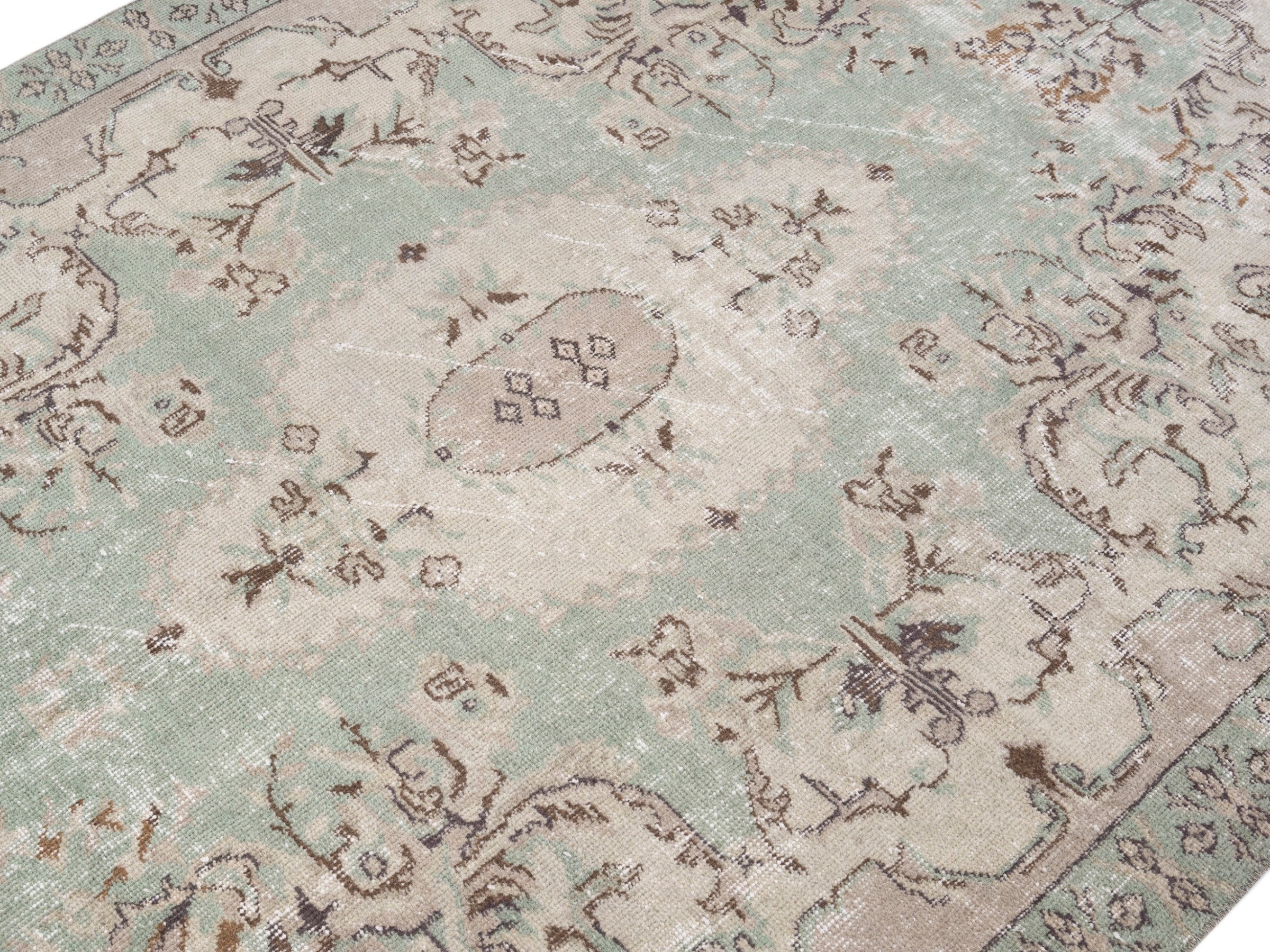 Turkish Isparta area rug in sage and muted pink, view 5 of 10