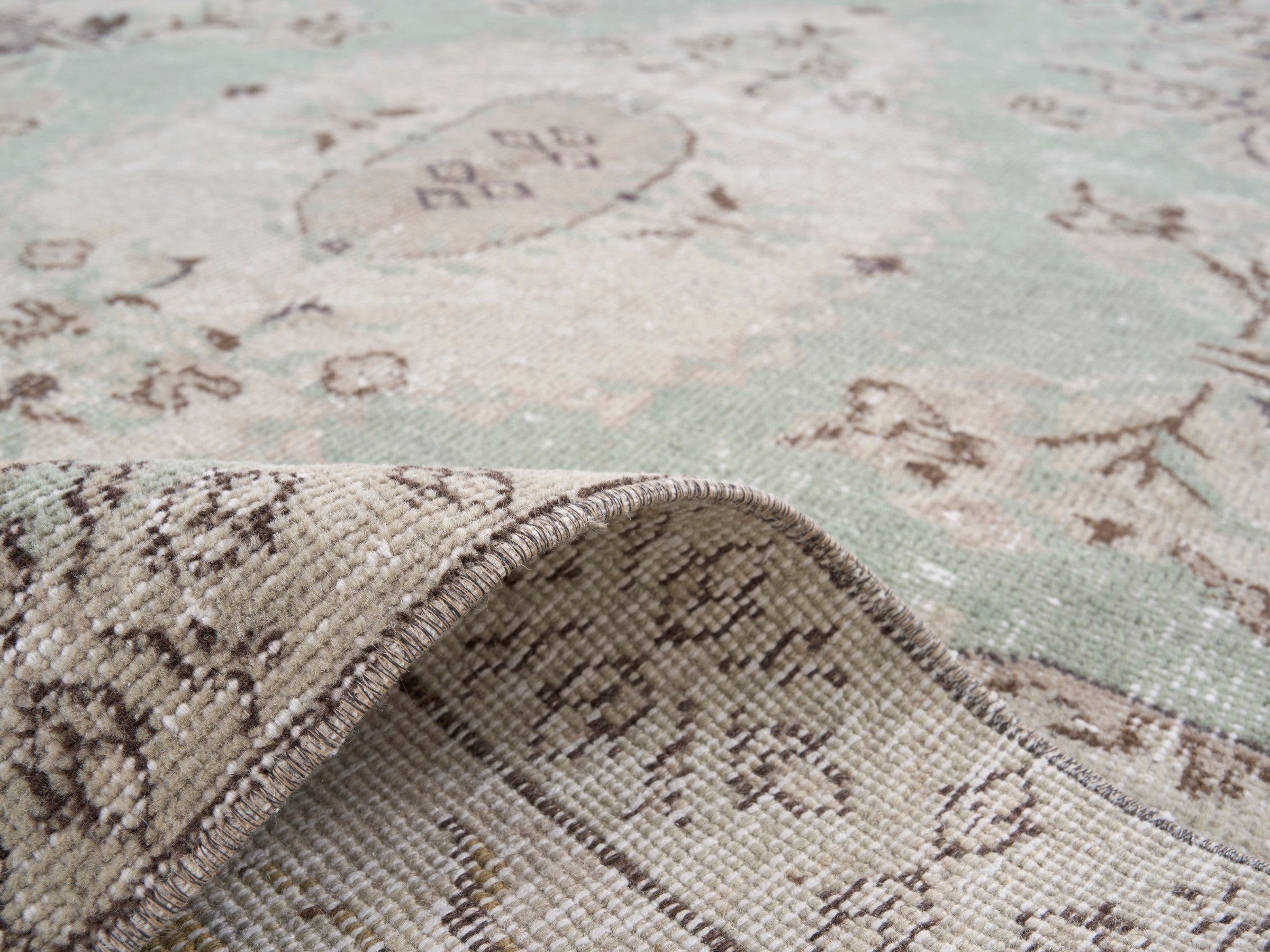 Turkish Isparta area rug in sage and muted pink, view 9 of 10