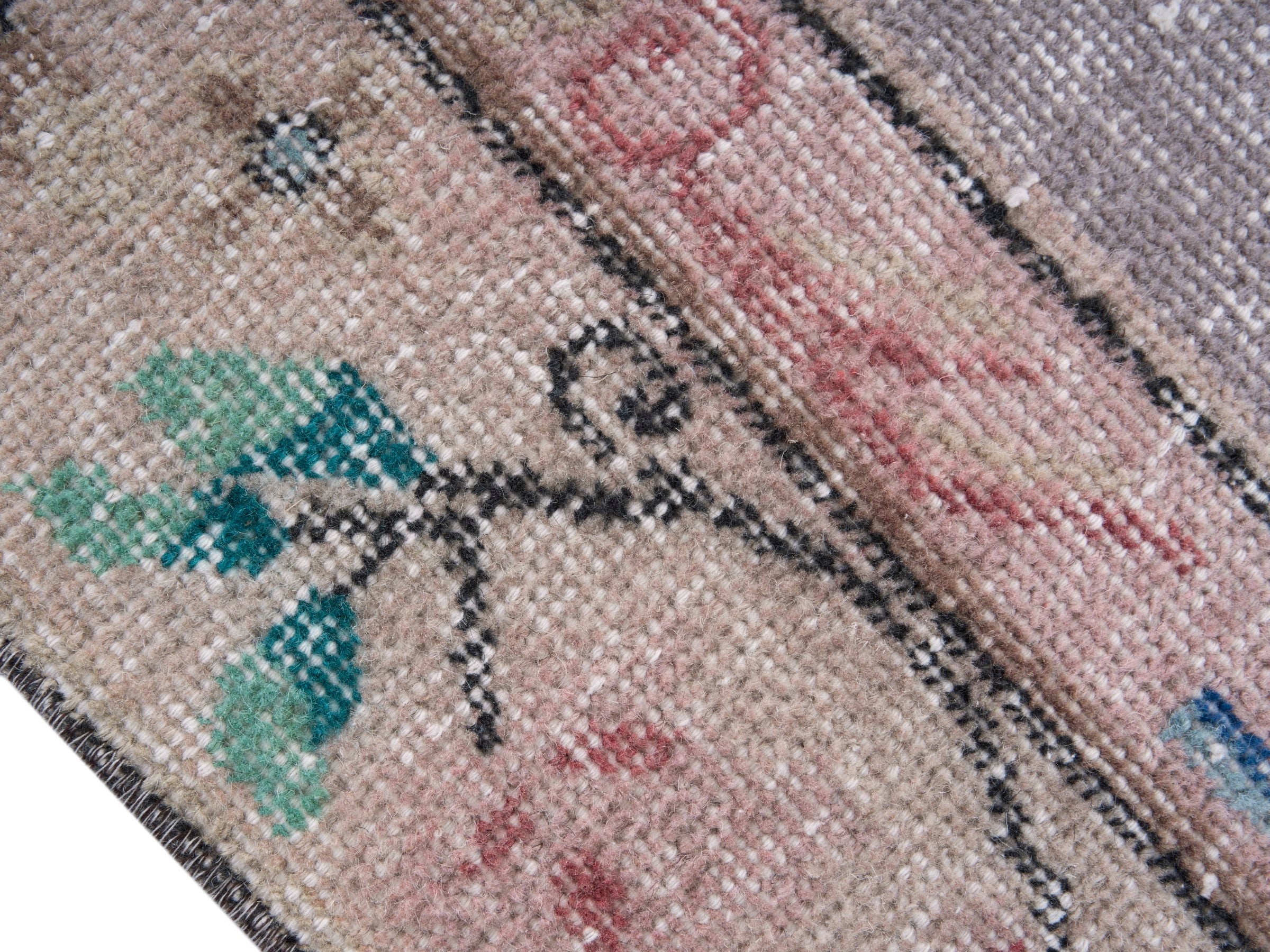 Turkish Isparta area rug in dusty blue and muted pink, view 6 of 10