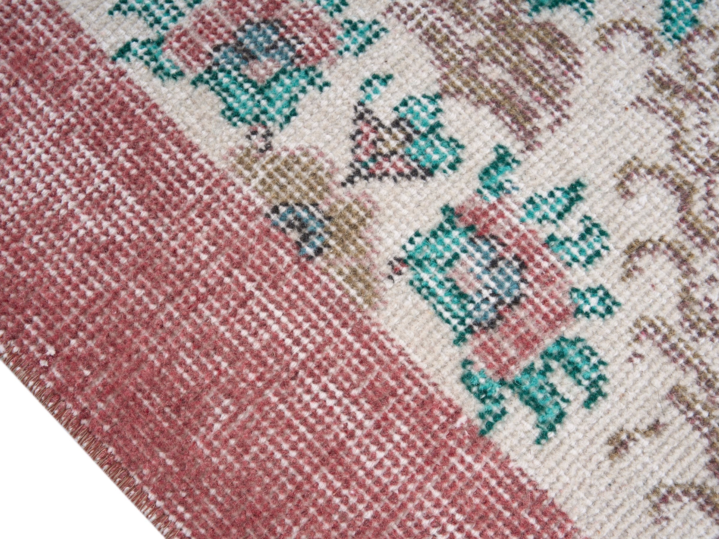 Turkish Isparta area rug in cream and dusty rose, view 6 of 10