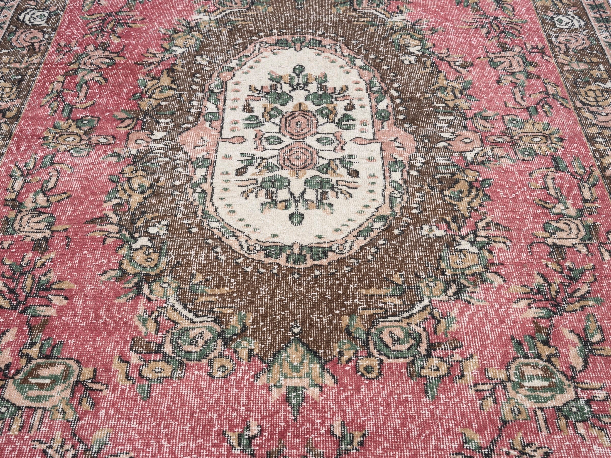 Turkish Isparta area rug in muted pink and dark brown, view 4 of 10
