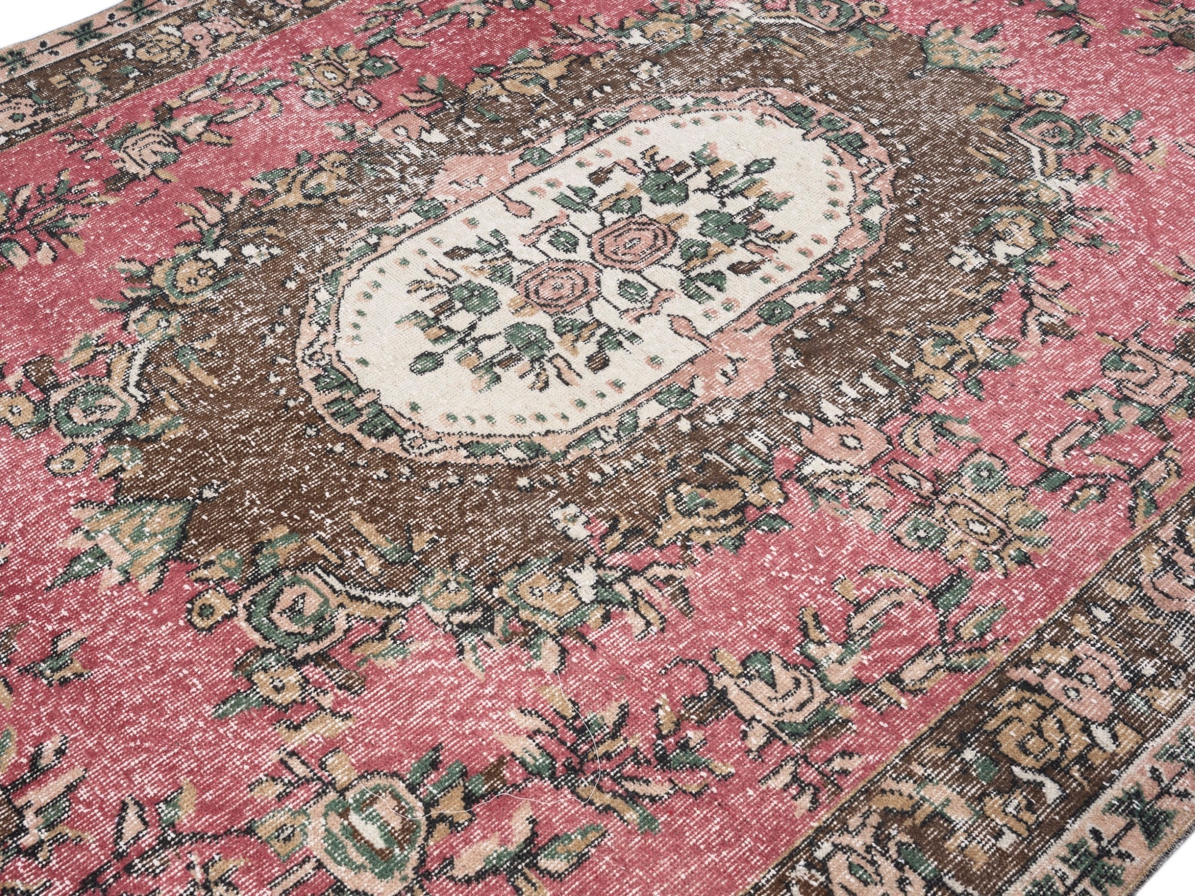 Turkish Isparta area rug in muted pink and dark brown, view 5 of 10
