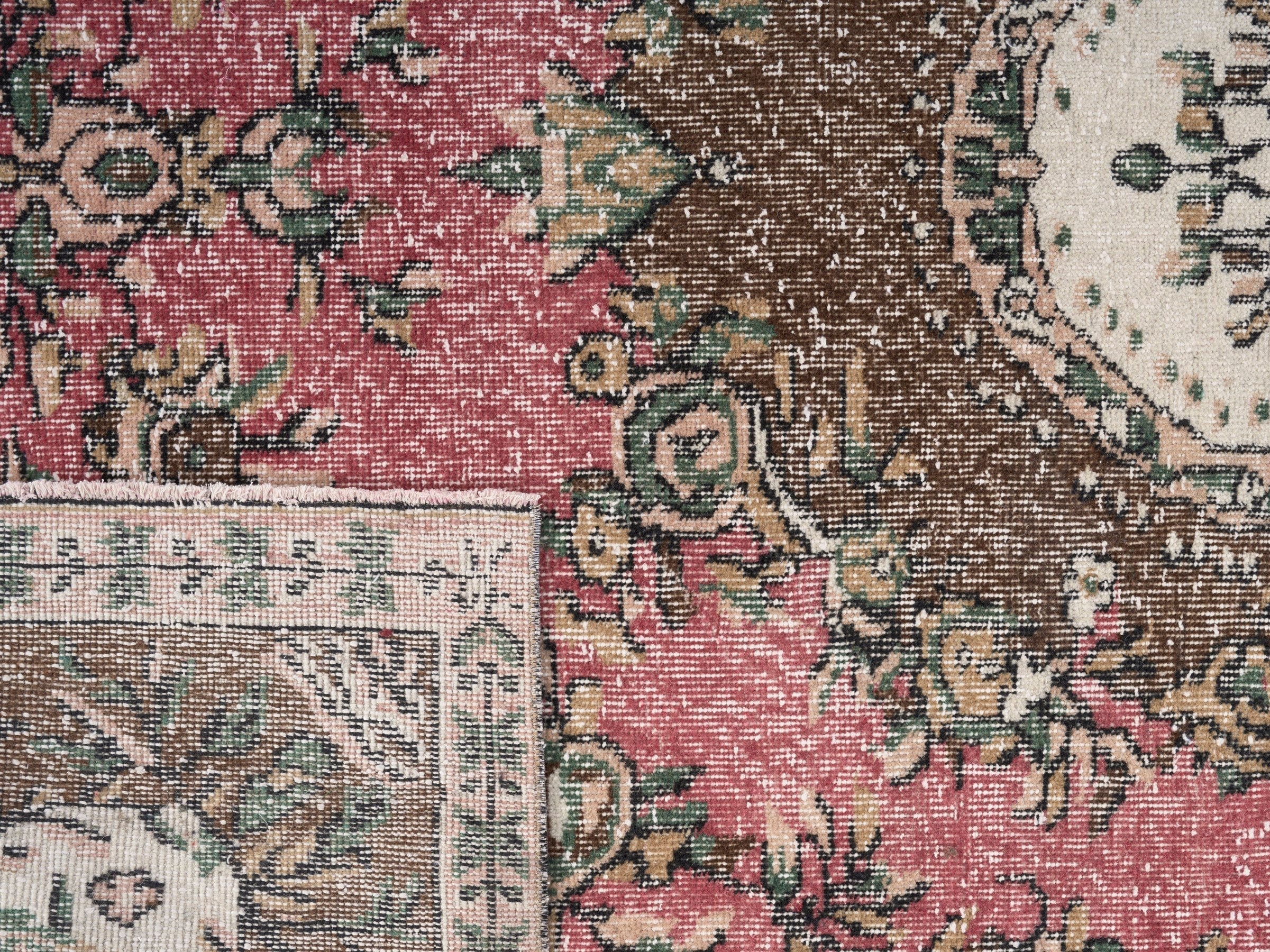Turkish Isparta area rug in muted pink and dark brown, view 10 of 10