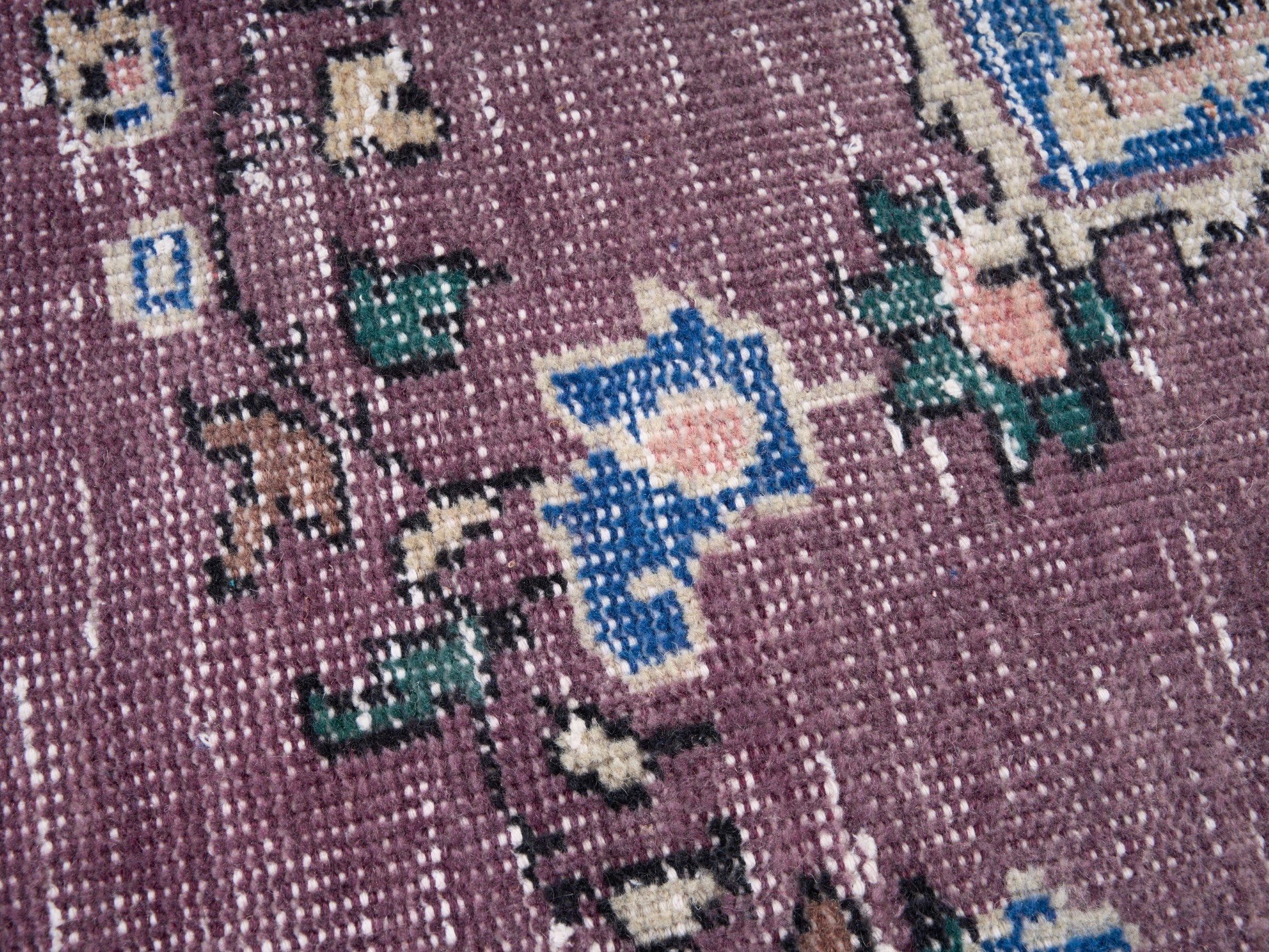 Turkish Isparta area rug in dusty rose and navy, view 7 of 10