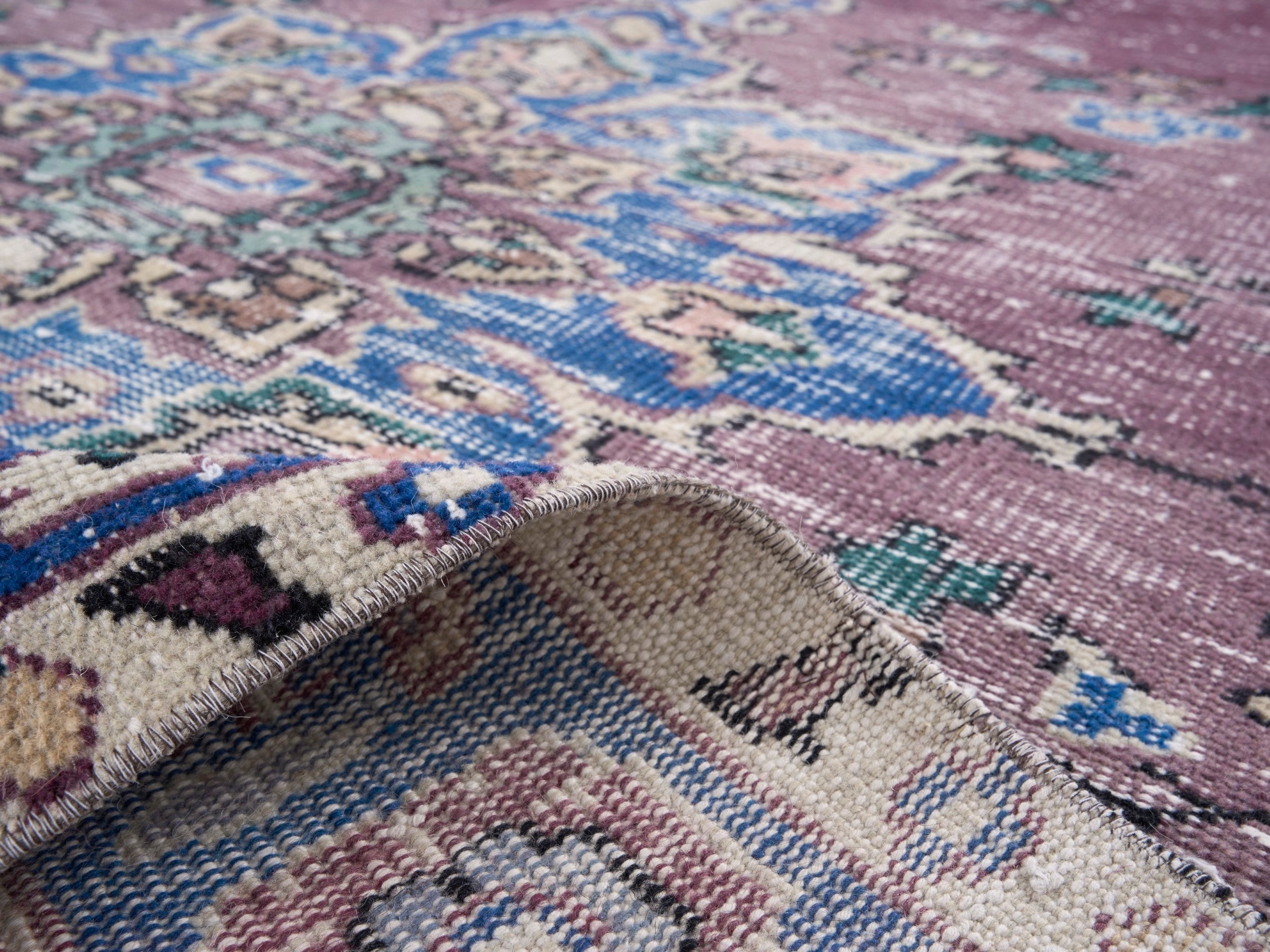 Turkish Isparta area rug in dusty rose and navy, view 9 of 10