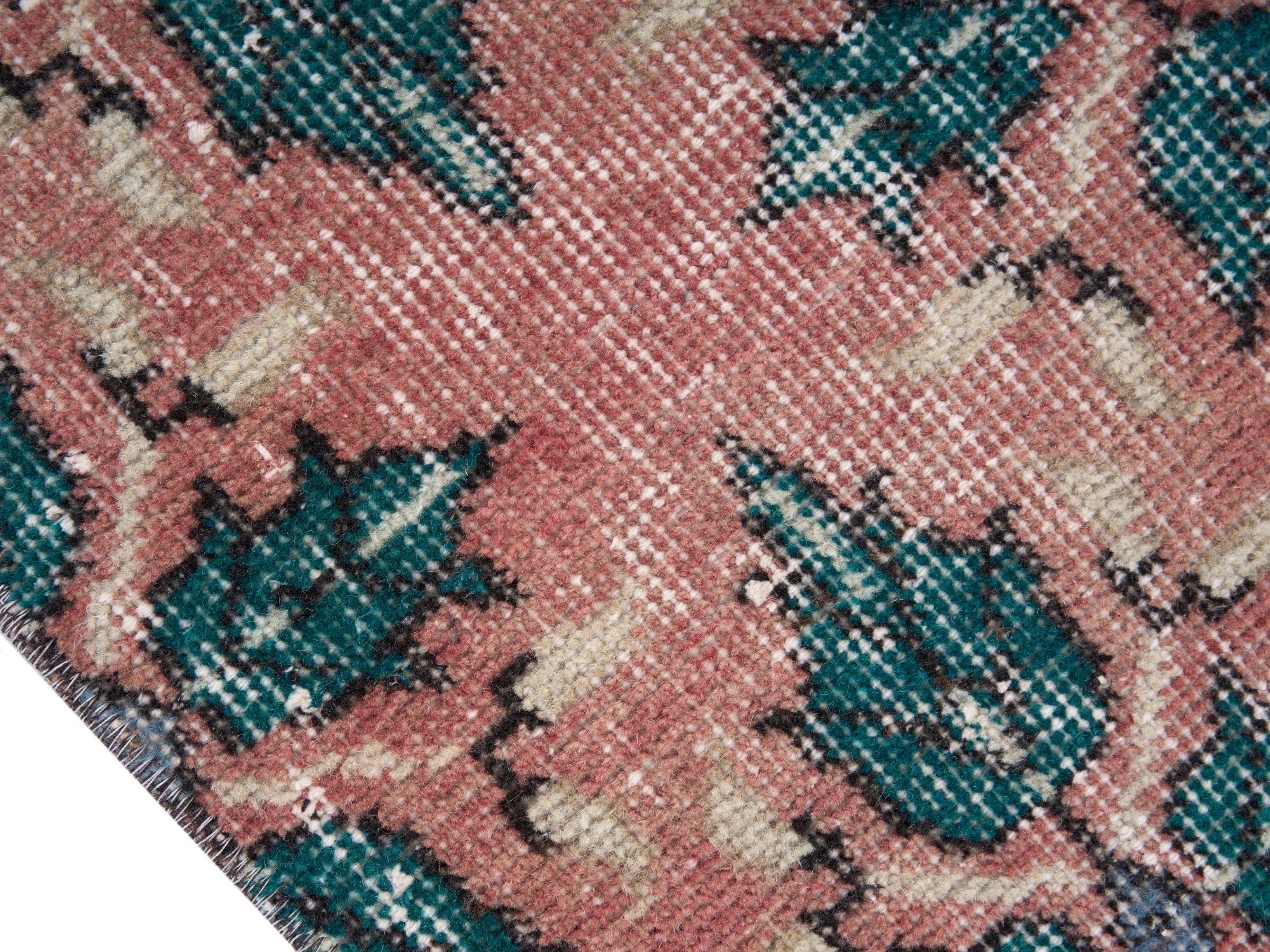 Turkish Isparta area rug in dusty rose and teal, view 6 of 10