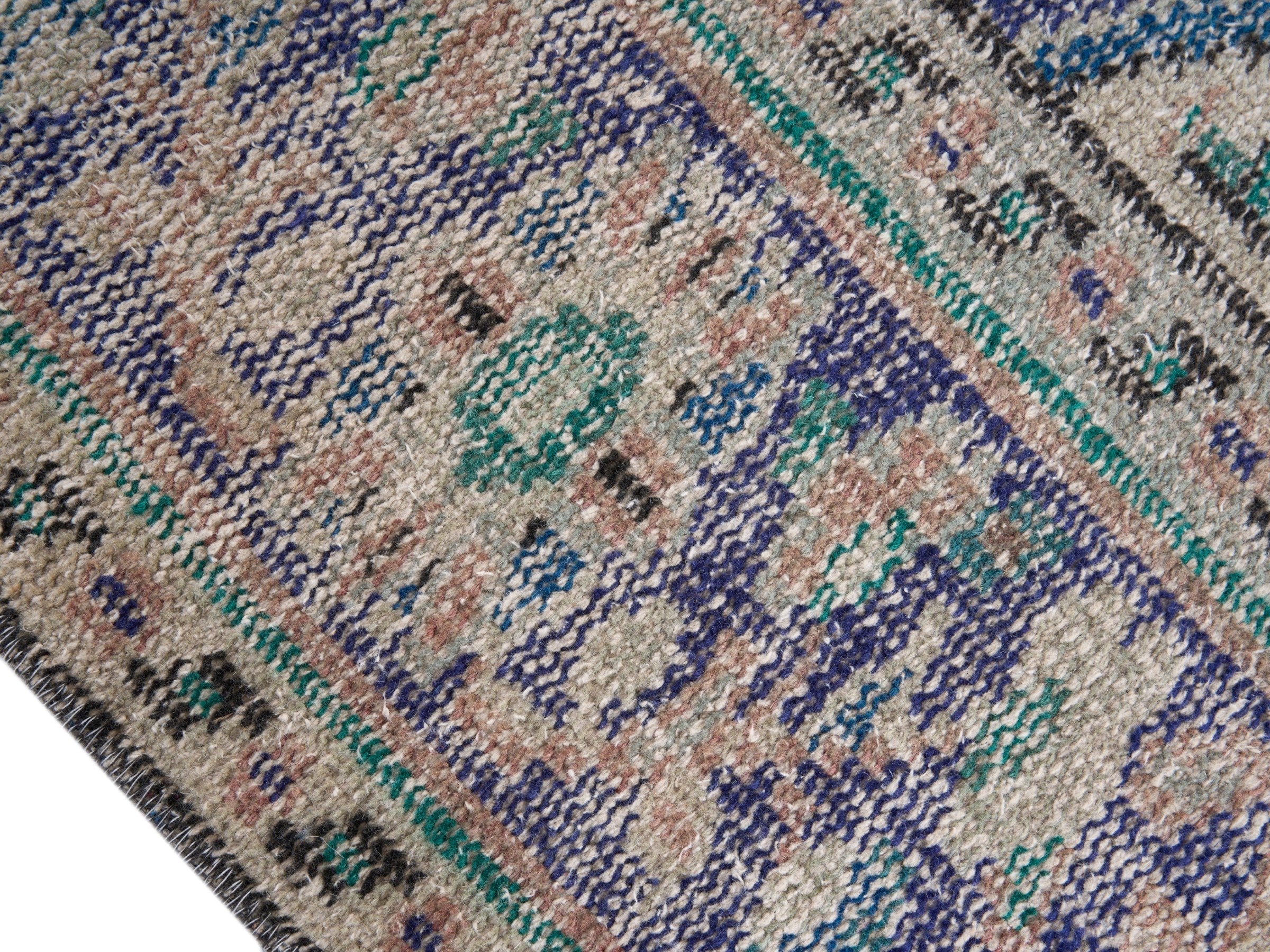 Turkish Manisa area rug in dusty rose and slate blue, view 6 of 10