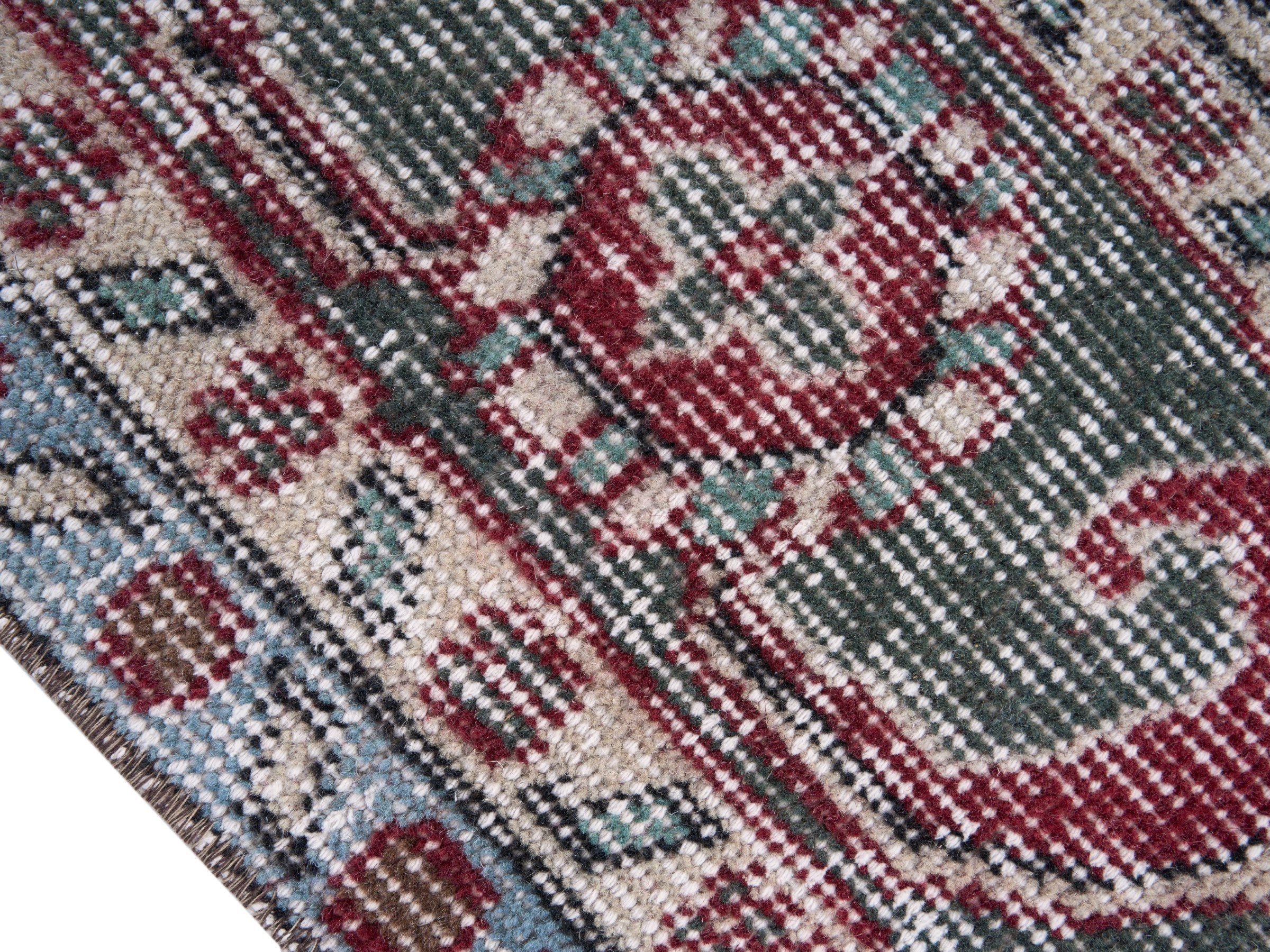 Turkish Isparta area rug in faded red and greige, view 6 of 10