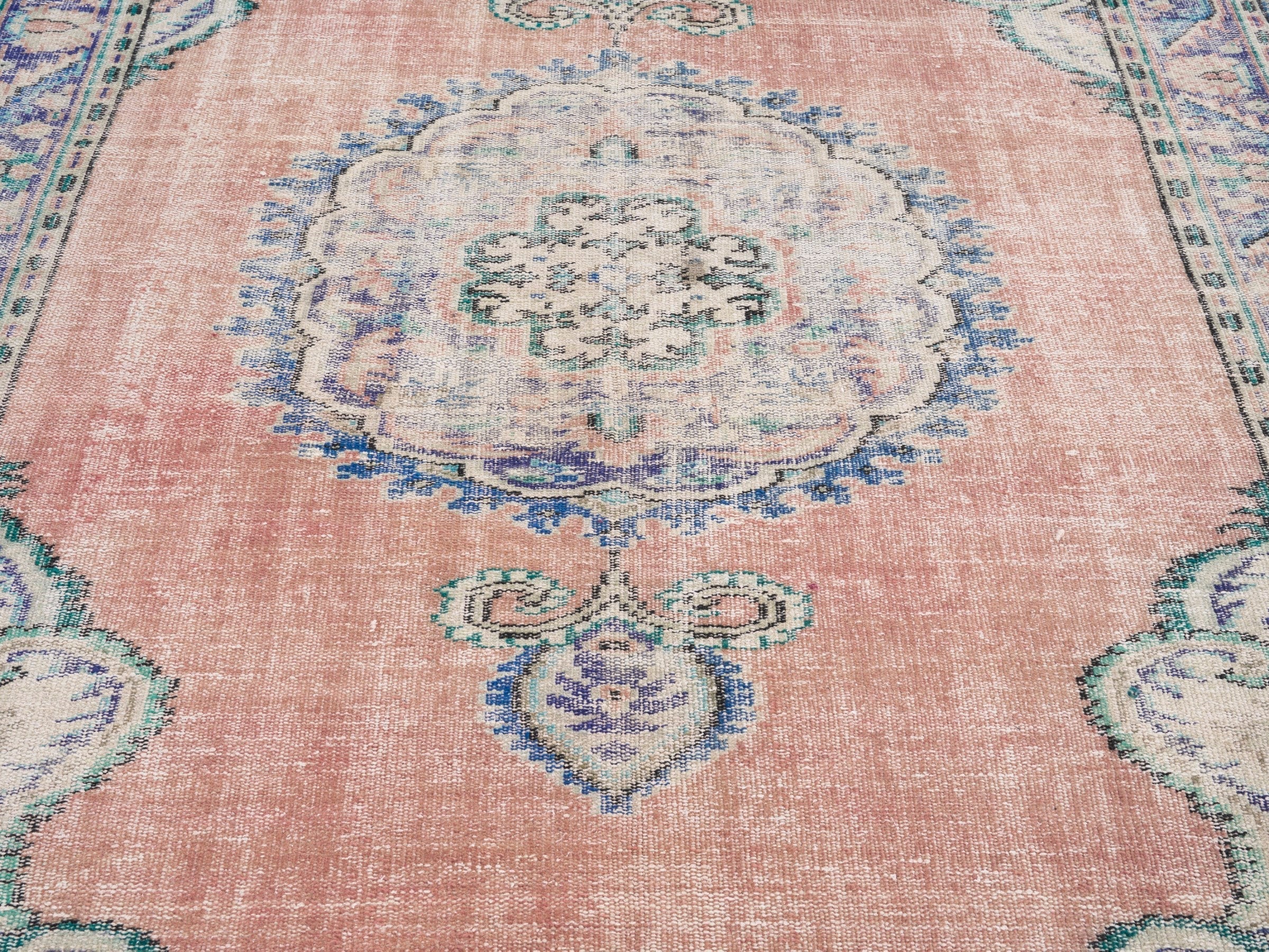 Turkish Manisa area rug in dusty rose and navy, view 4 of 10