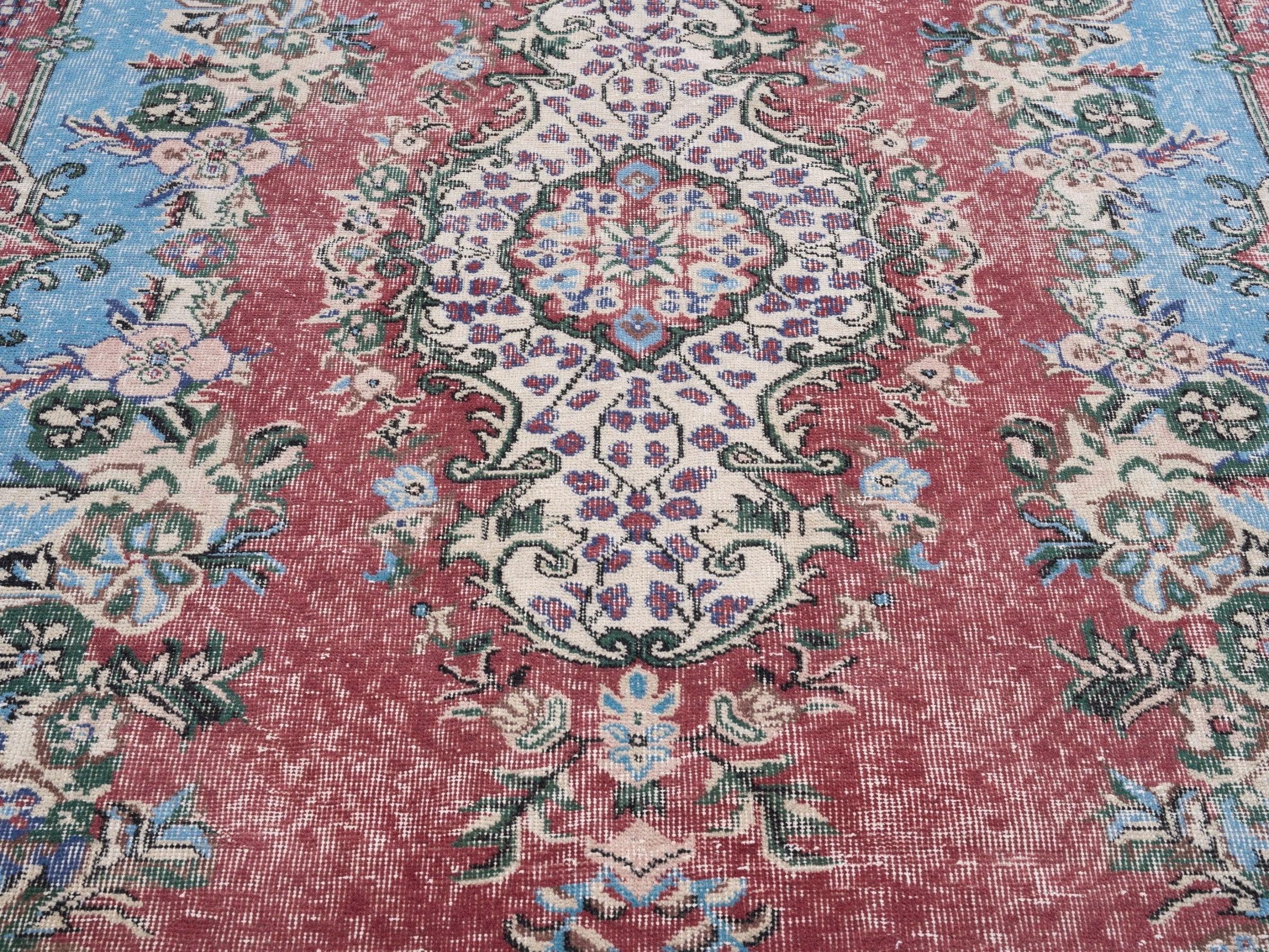 Turkish Isparta area rug in faded red and sky, view 4 of 10