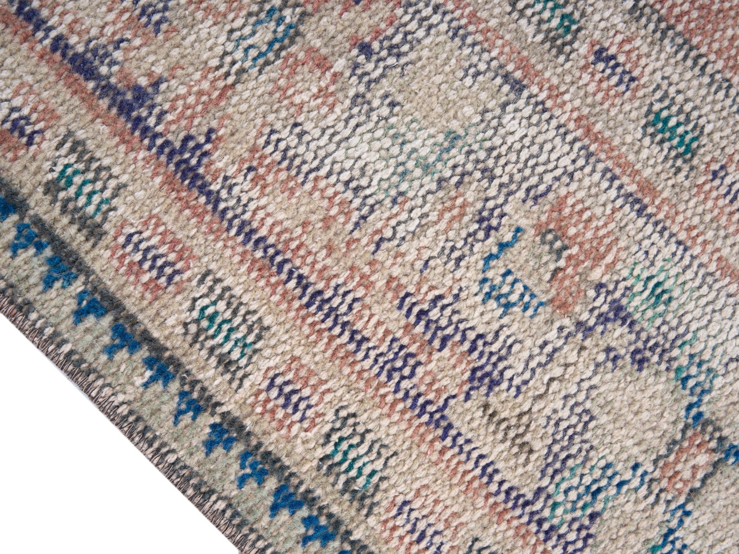 Turkish Manisa area rug in muted pink and denim, view 6 of 10