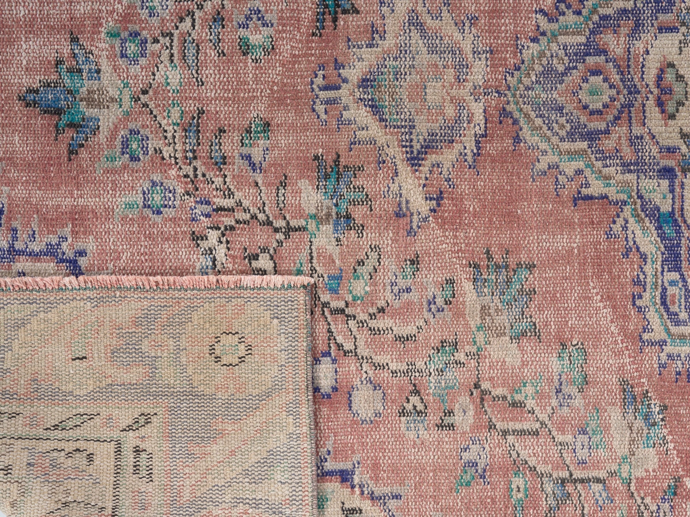 Turkish Manisa area rug in muted pink and navy, view 10 of 10
