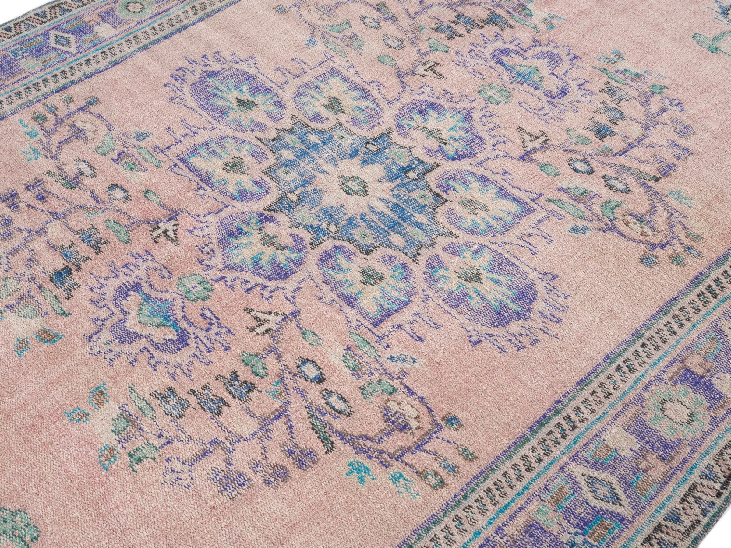 Turkish Manisa area rug in muted pink and dusty blue, view 5 of 10