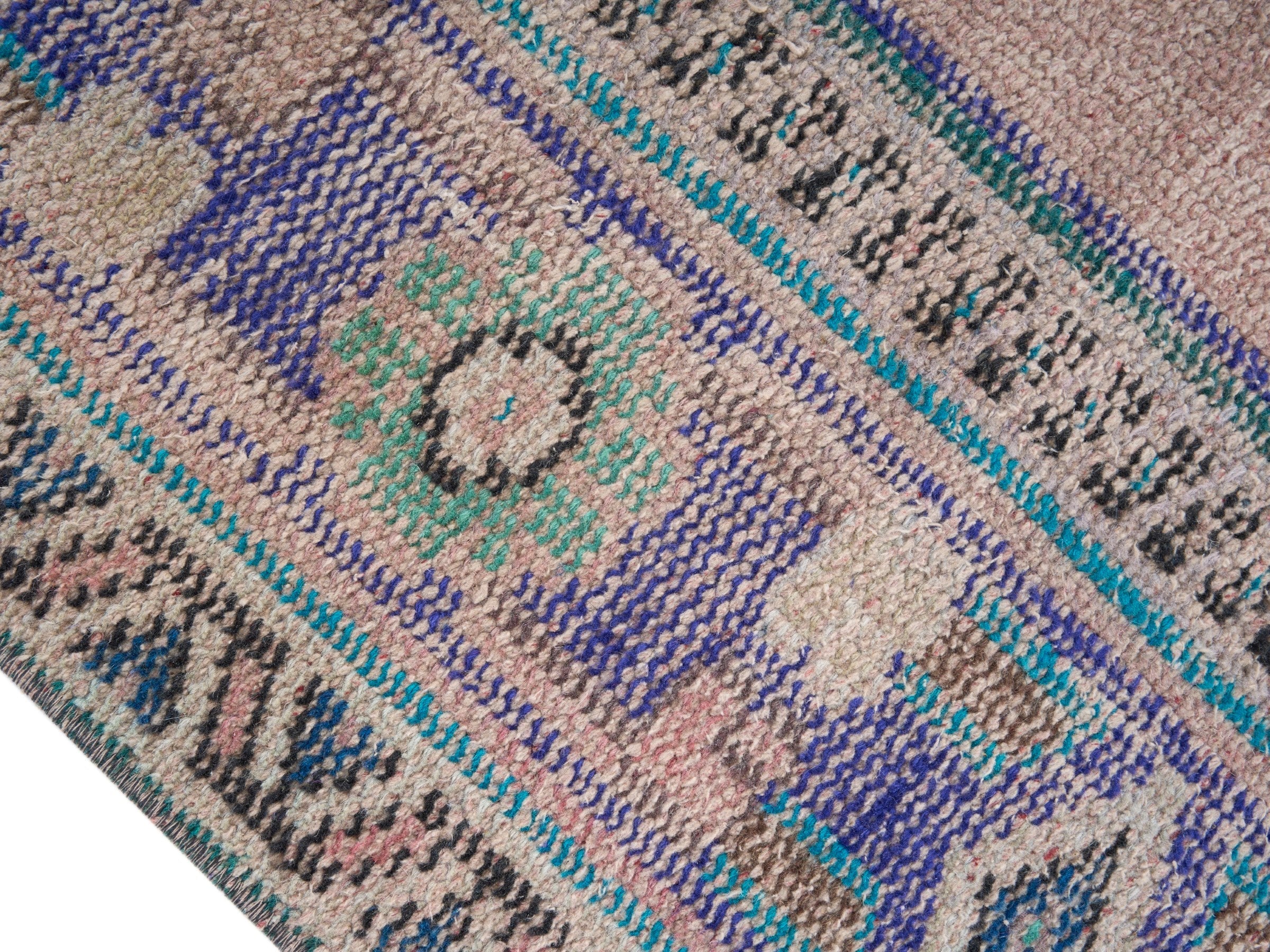 Turkish Manisa area rug in muted pink and dusty blue, view 6 of 10