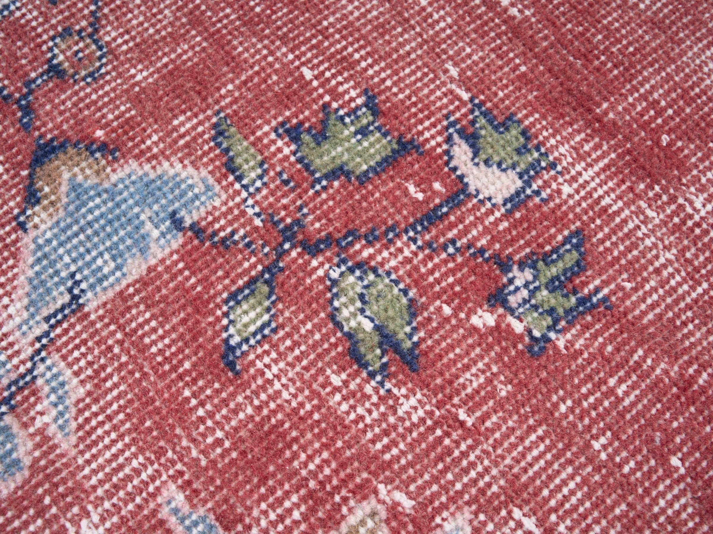 Turkish Isparta area rug in dusty rose and off-white, view 6 of 10