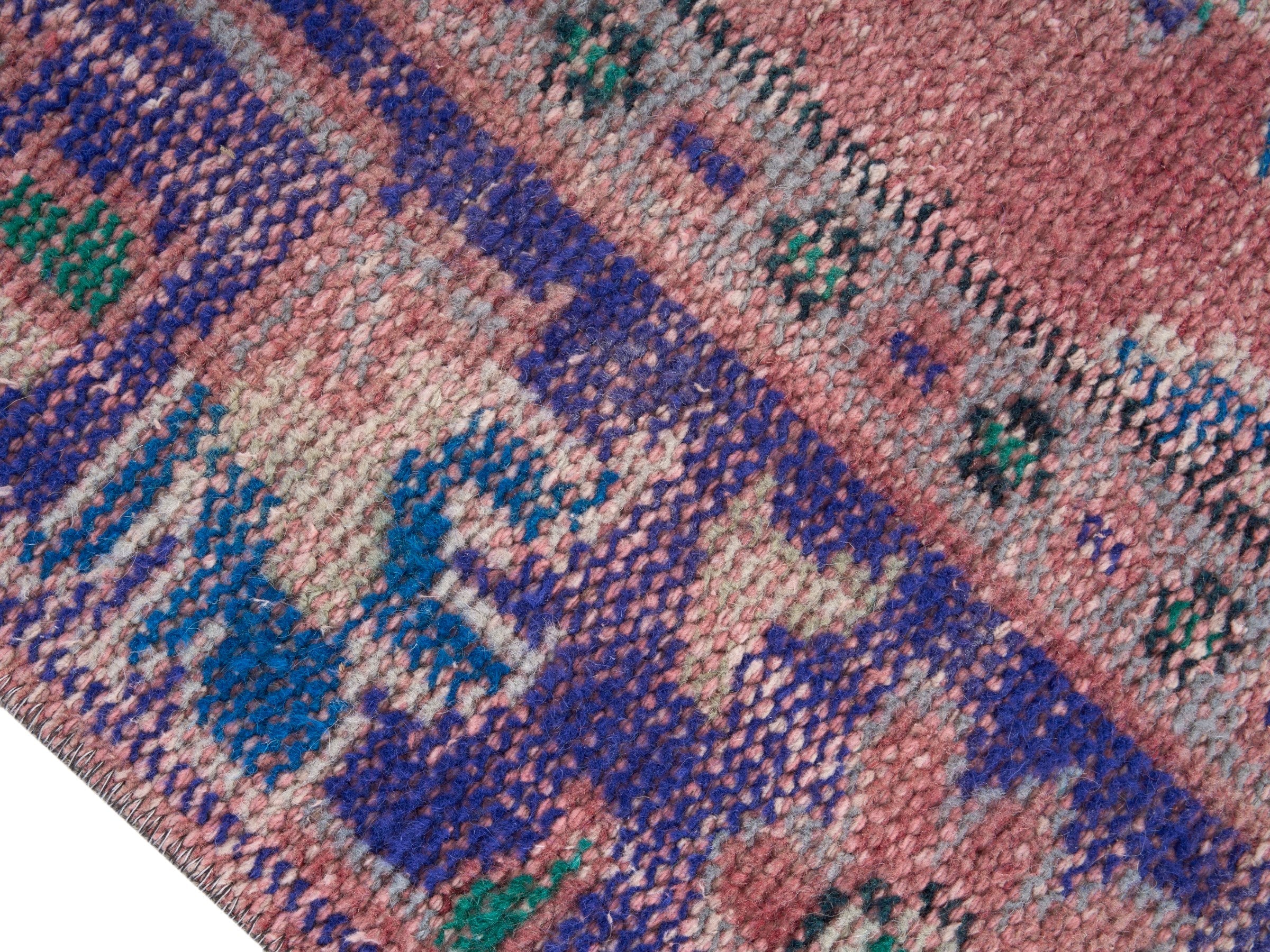 Turkish Manisa area rug in dusty rose and plum, view 6 of 10