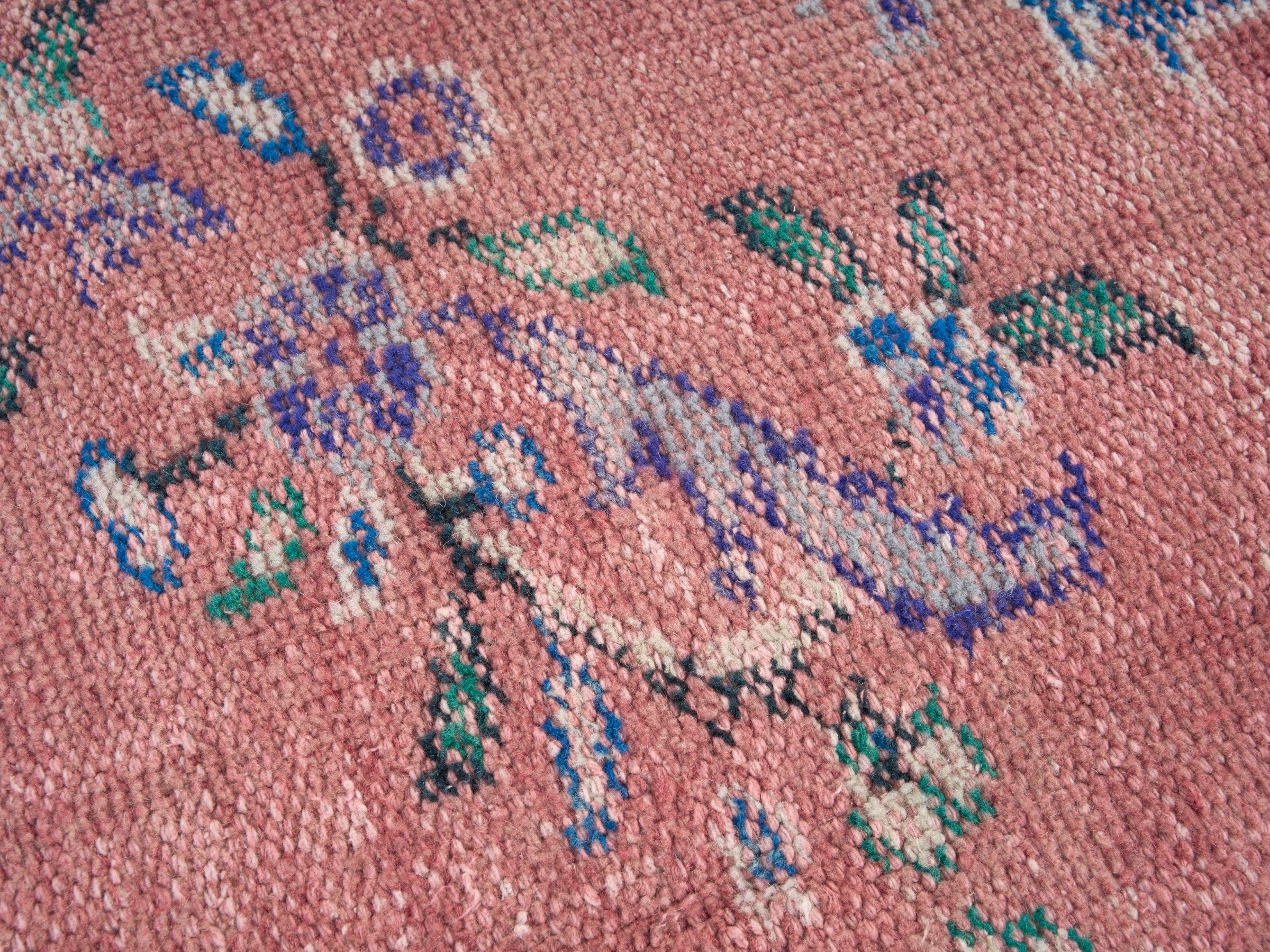 Turkish Manisa area rug in dusty rose and plum, view 7 of 10