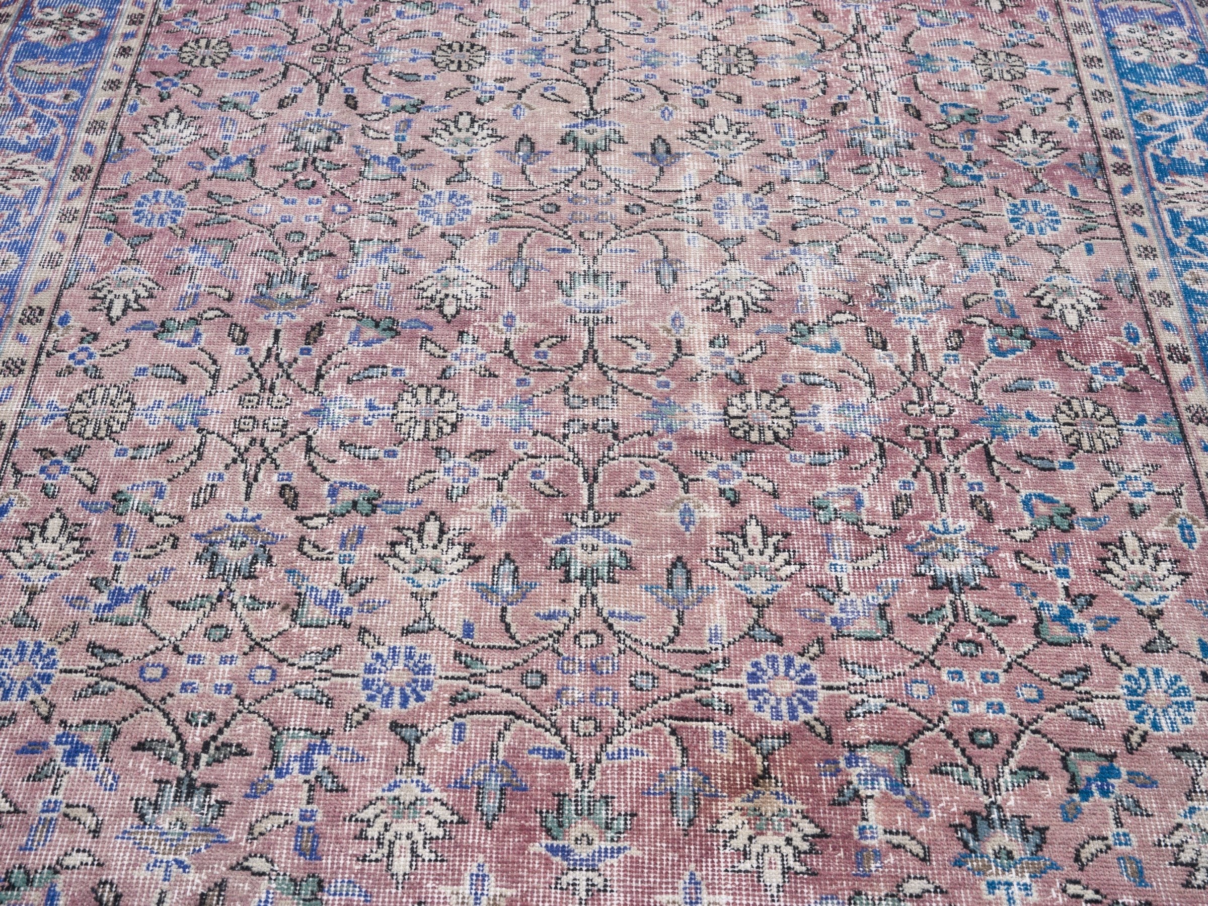 Turkish Isparta area rug in muted pink and dark blue, view 4 of 10