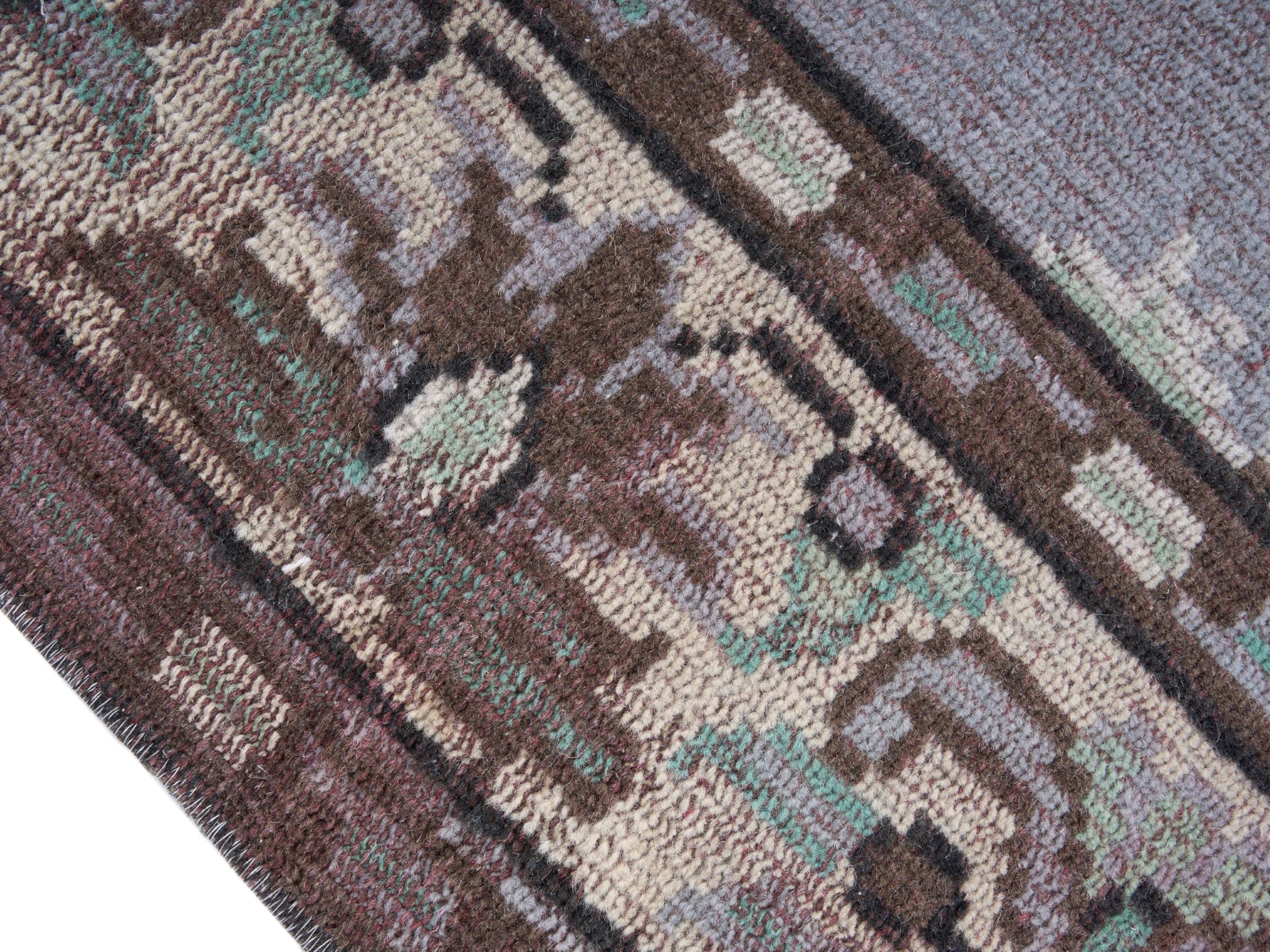 Turkish Manisa area rug in dusty rose and cream, view 6 of 10