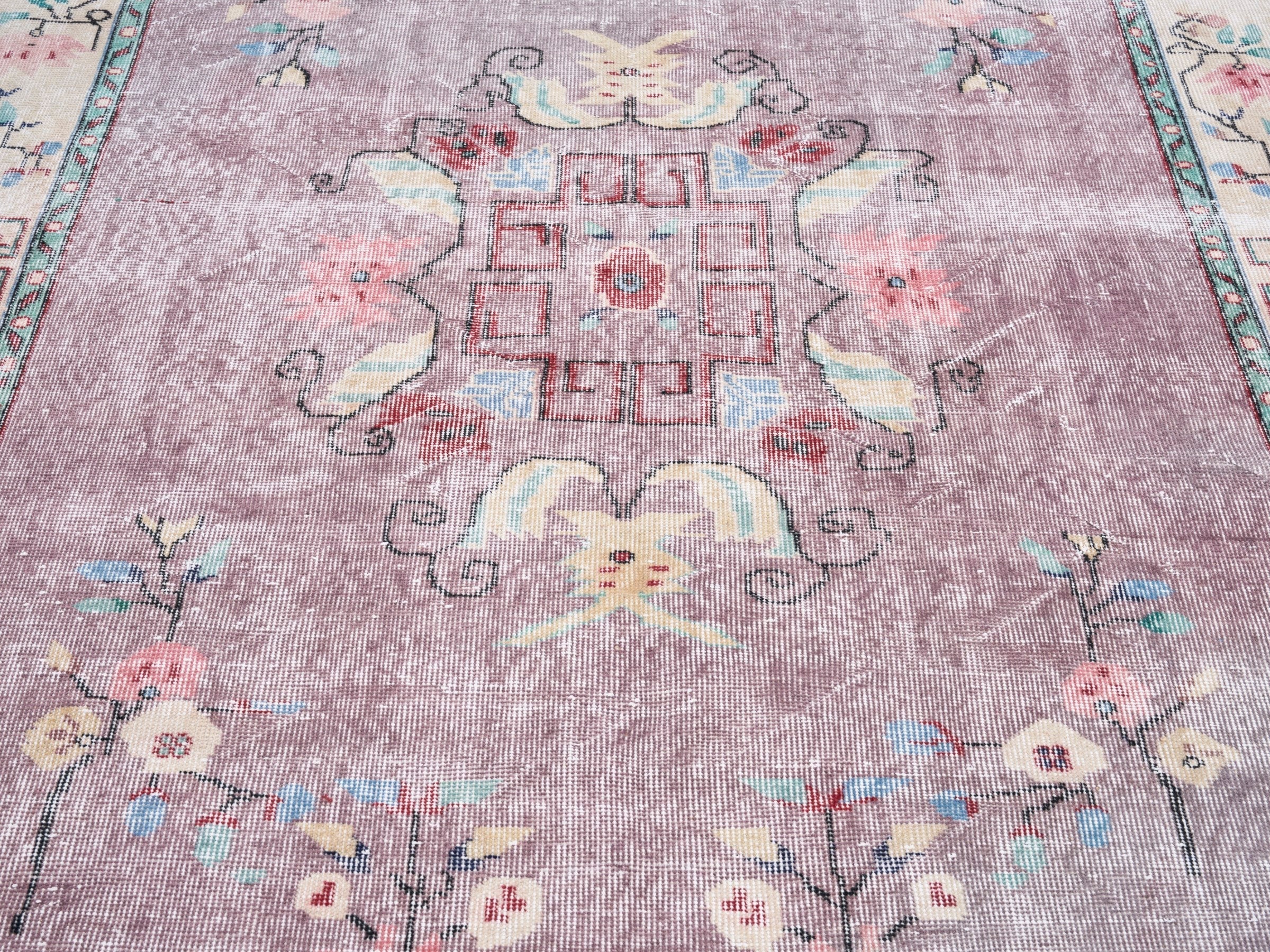 Turkish Isparta area rug in dusty rose and muted pink, view 4 of 10