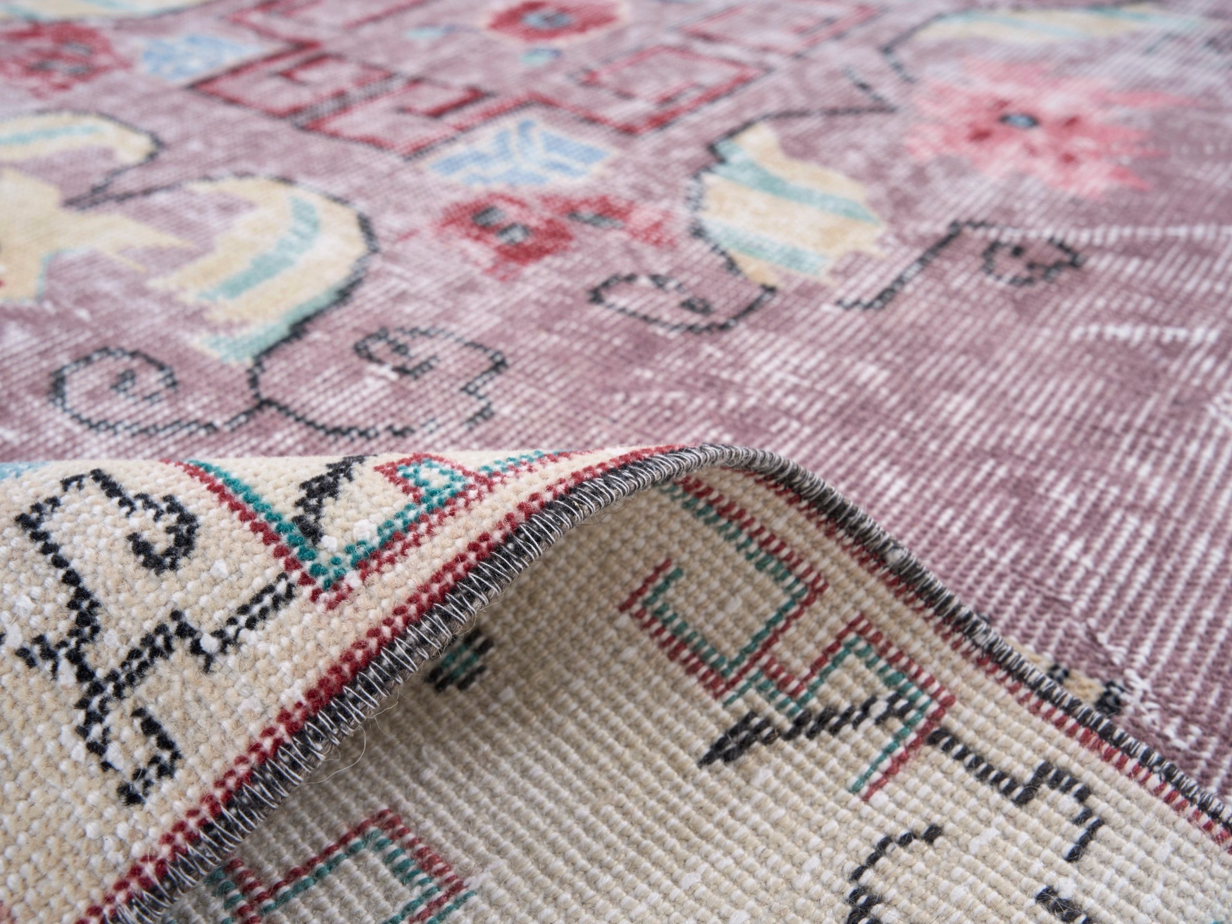 Turkish Isparta area rug in dusty rose and muted pink, view 9 of 10
