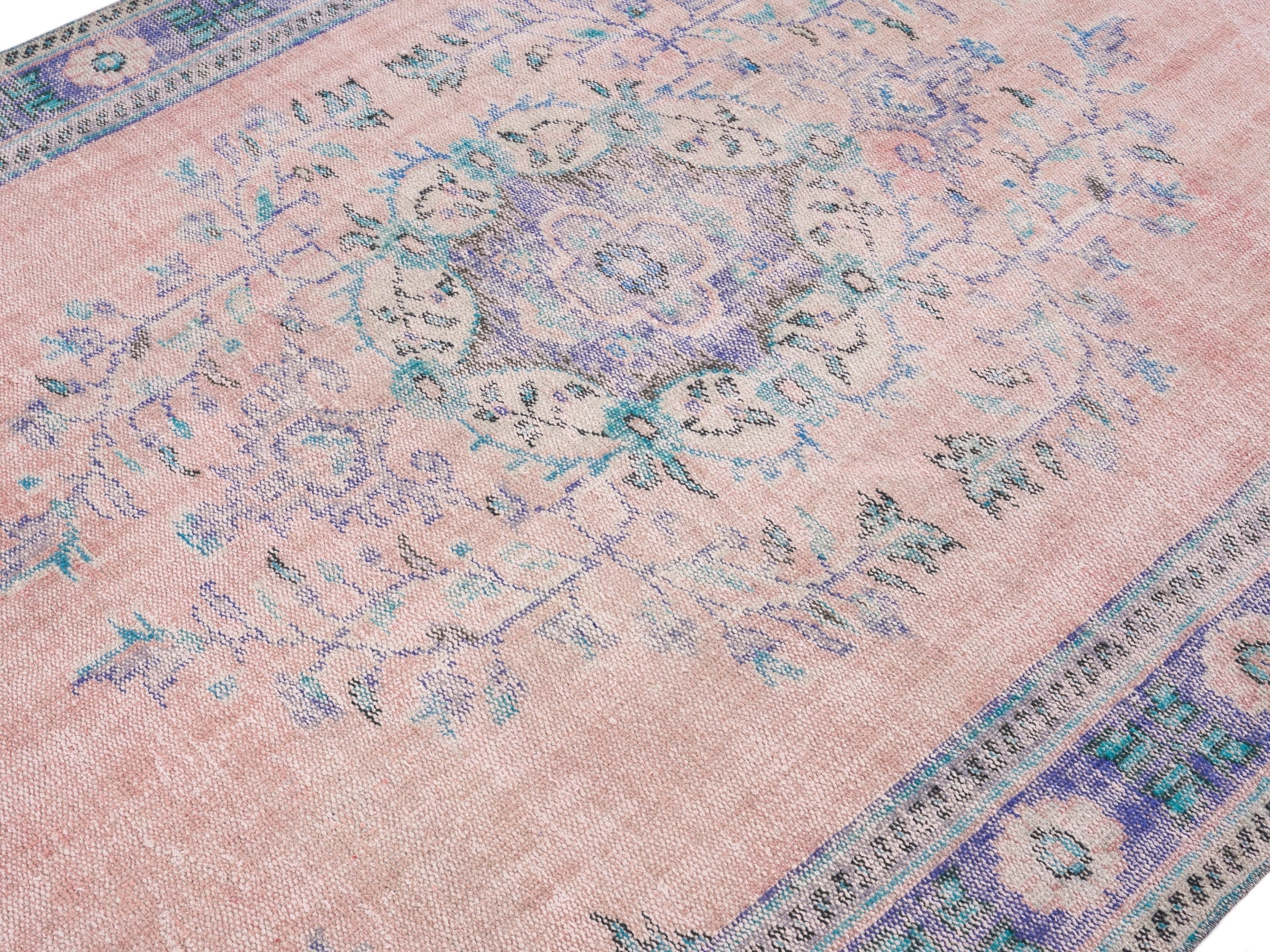 Turkish Manisa area rug in dusty rose and slate blue, view 5 of 10