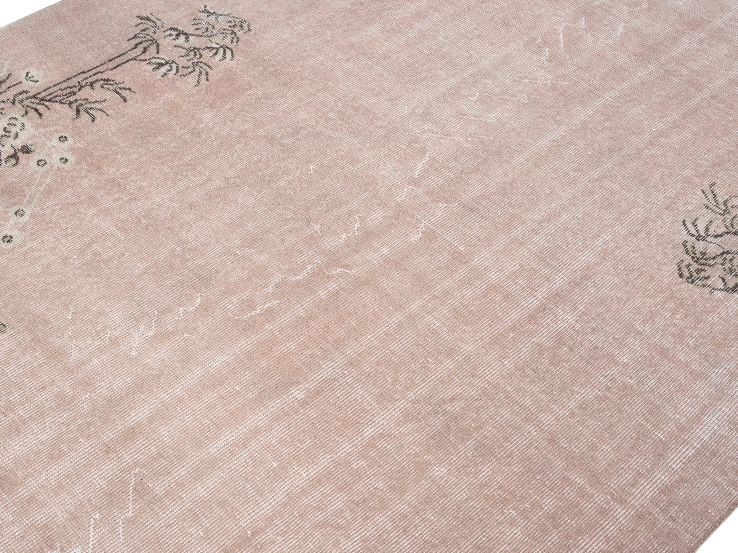 Turkish Isparta area rug in dusty rose and muted pink, view 5 of 10