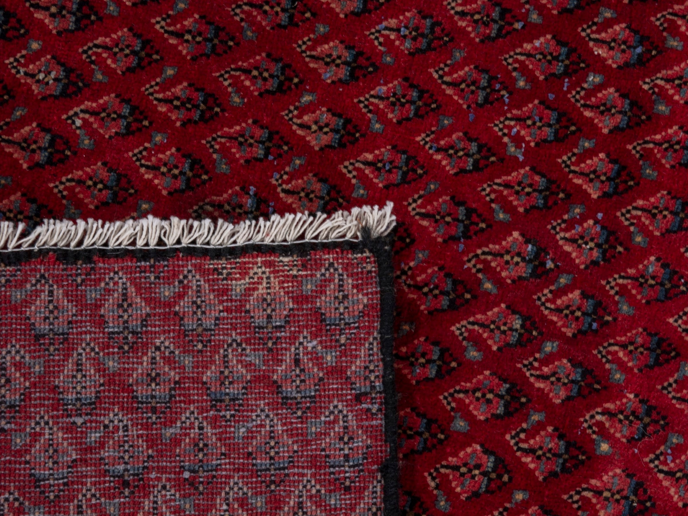 Persian Botteh accent rug in deep red and dusty rose, view 7 of 7