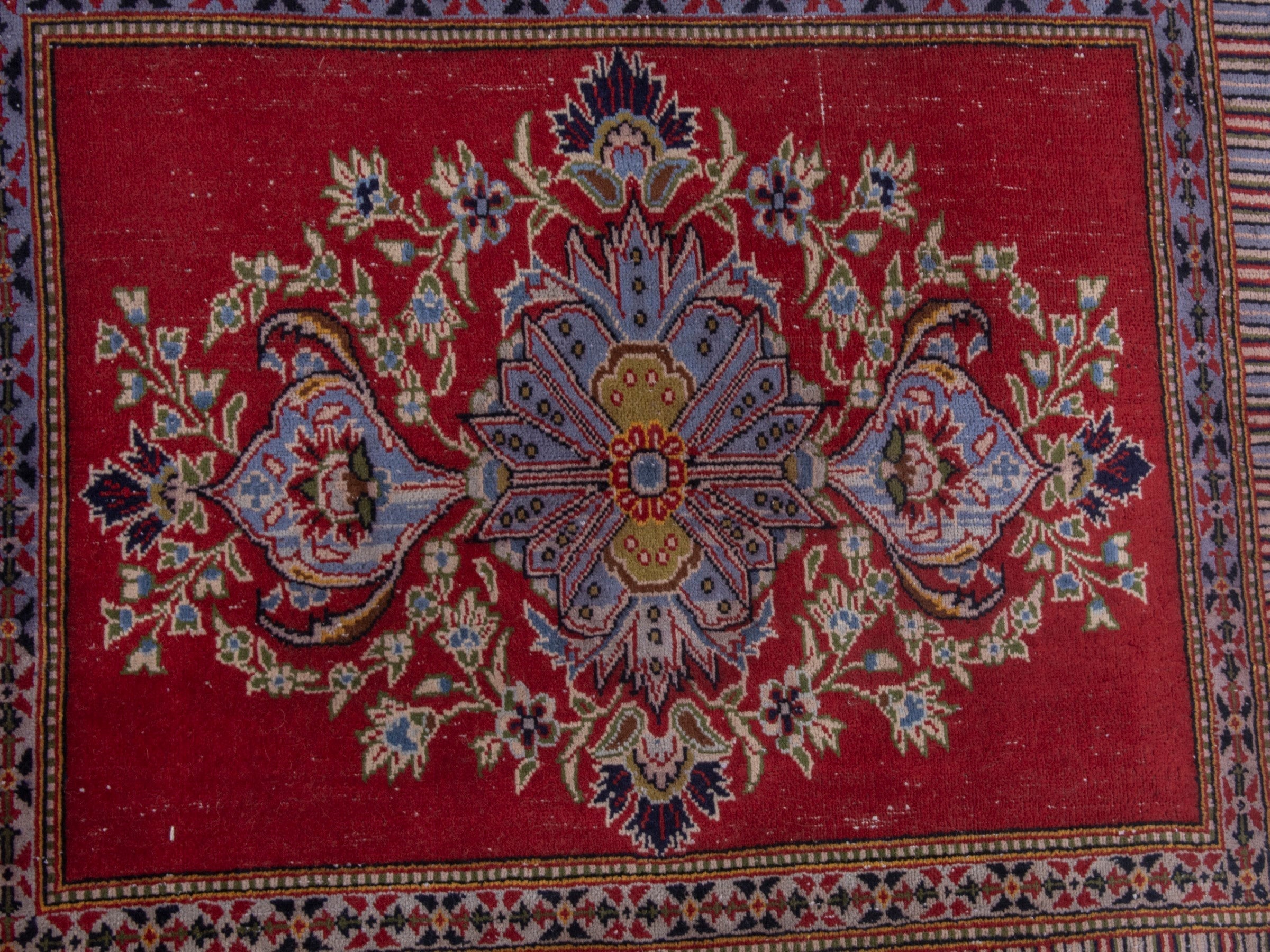 Persian Kashan accent rug in deep red and navy, view 6 of 7