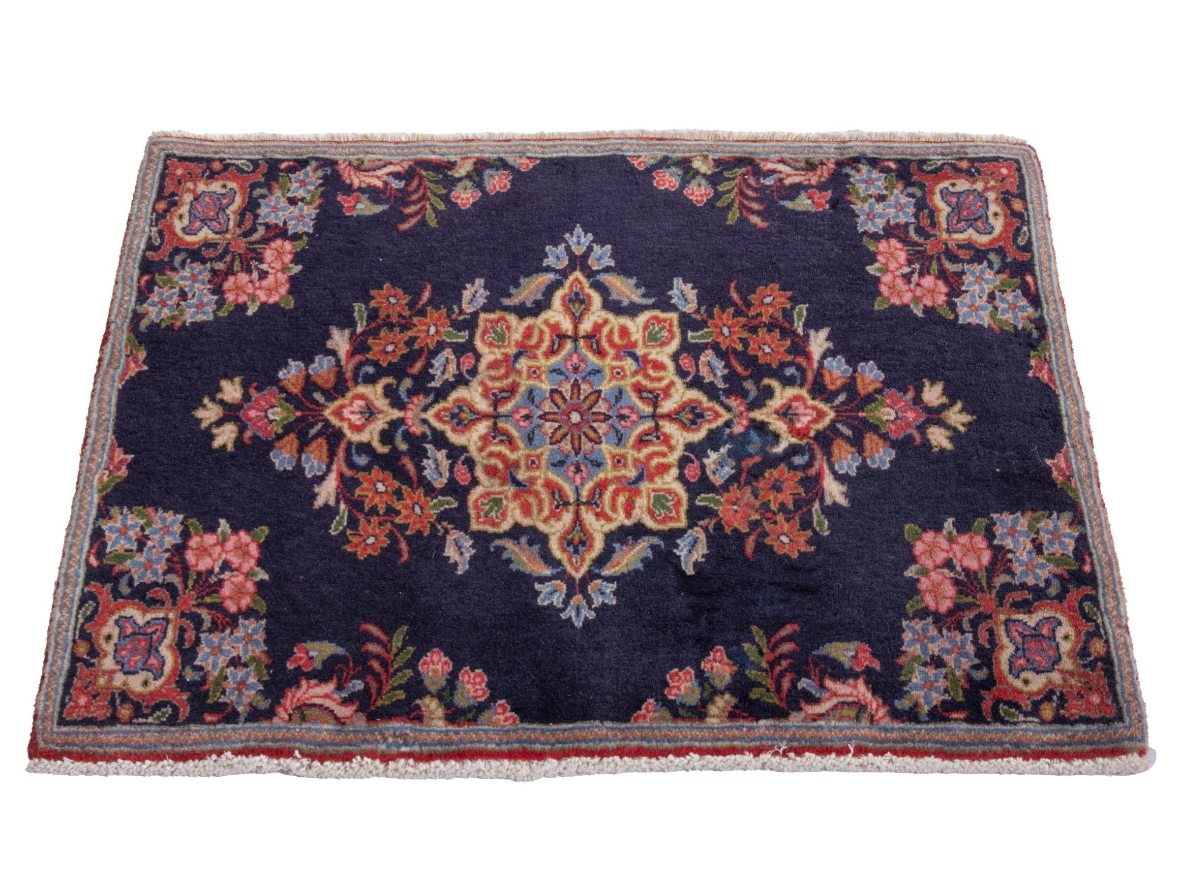 Persian Kashan accent rug in navy and rust, view 2 of 6