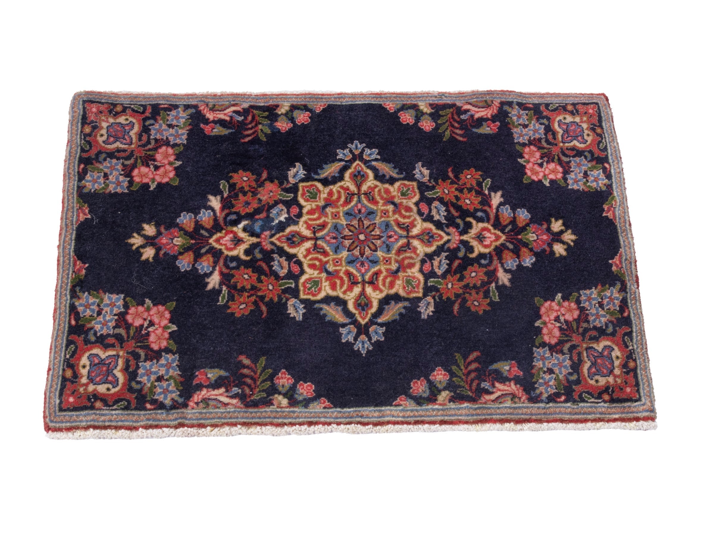 Persian Kashan accent rug in navy and rust, view 3 of 6
