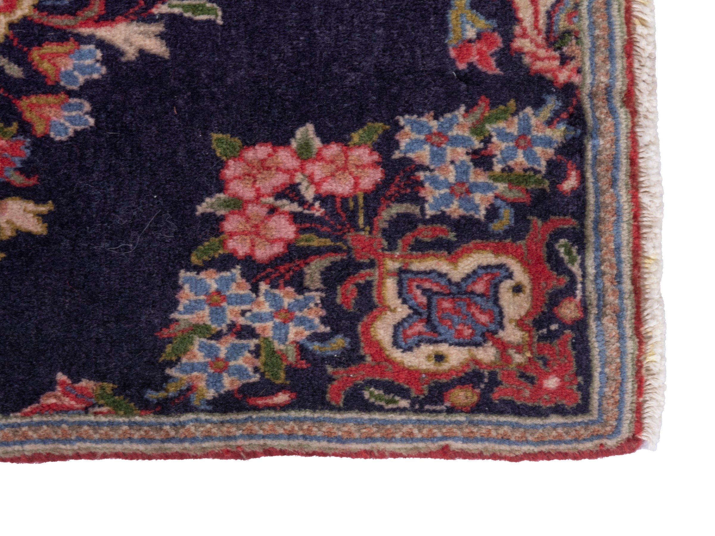 Persian Kashan accent rug in navy and rust, view 4 of 6