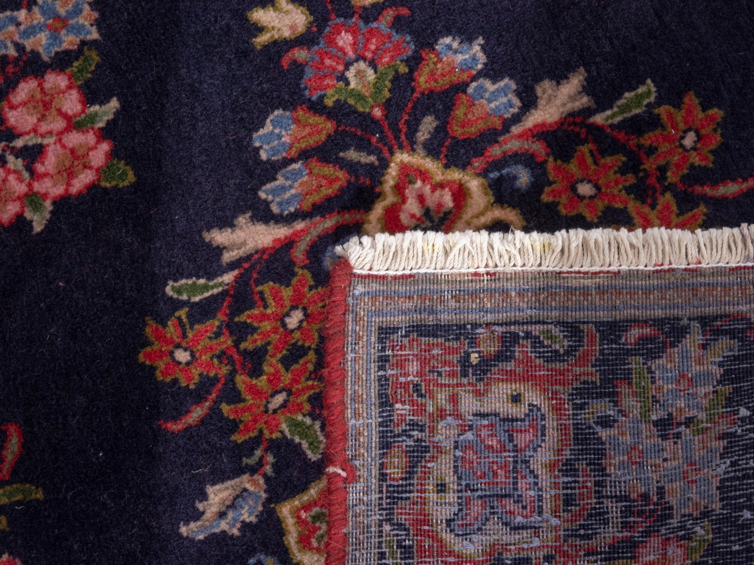 Persian Kashan accent rug in navy and rust, view 6 of 6