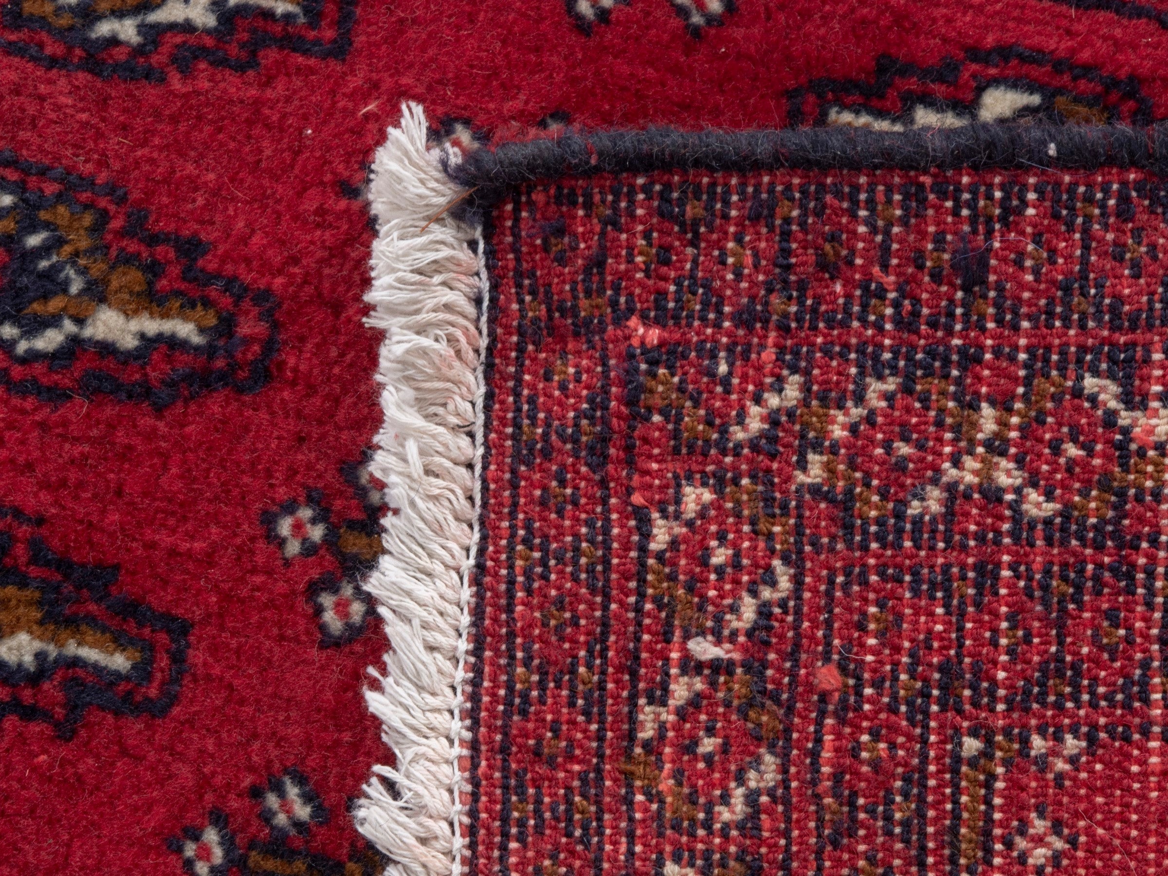 Persian Torkaman accent rug in deep red and burgundy, view 5 of 5