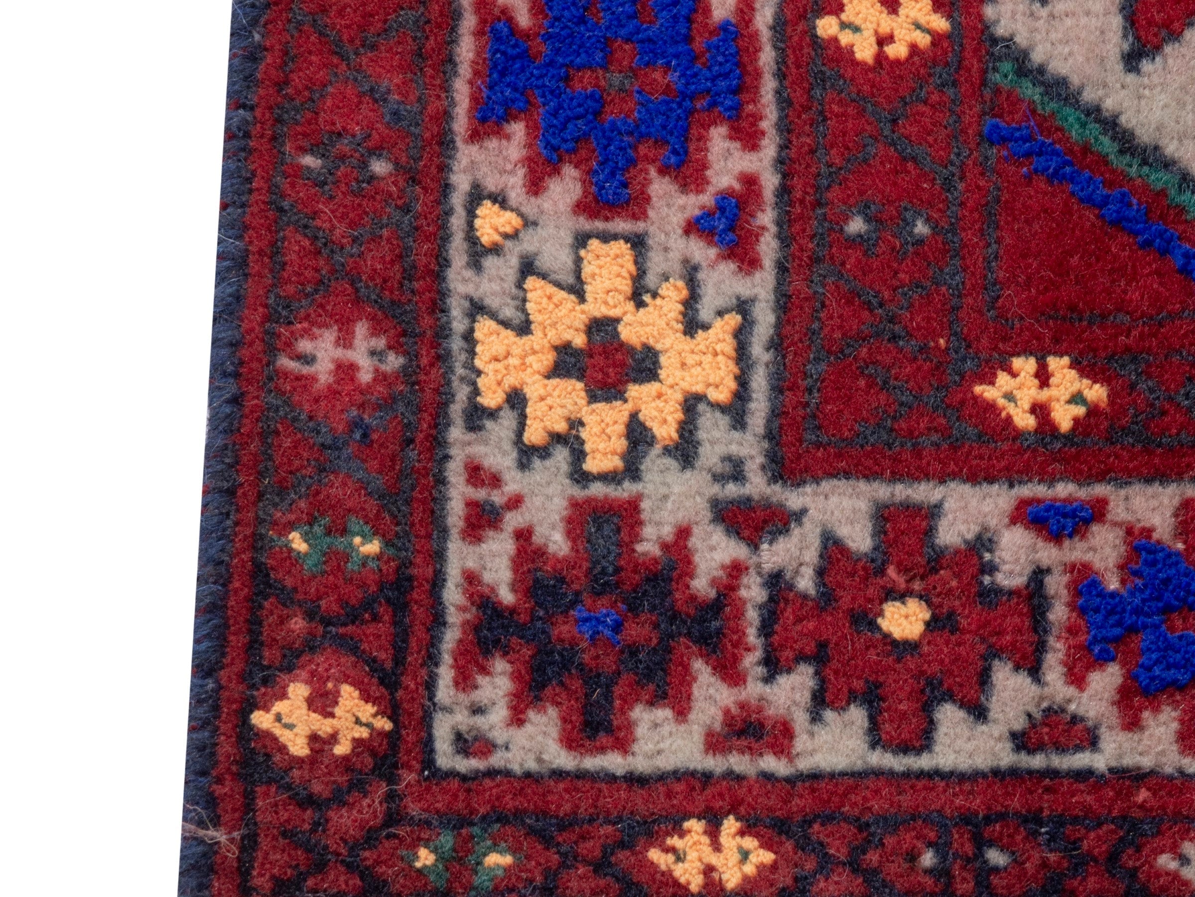 Persian Torkaman accent rug in deep red and burgundy, view 4 of 7