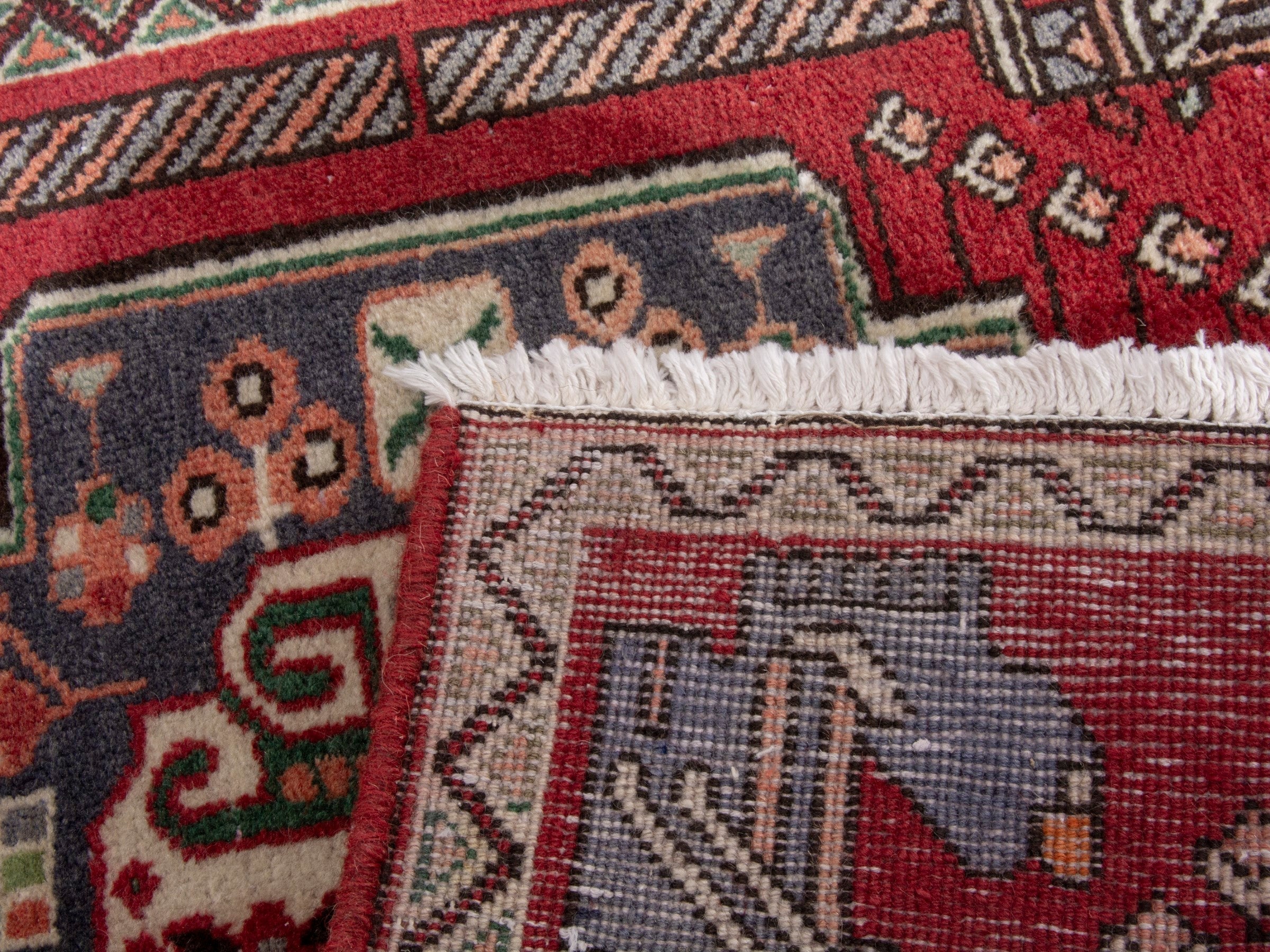 Persian Shiraz accent rug in deep red and navy, view 7 of 7