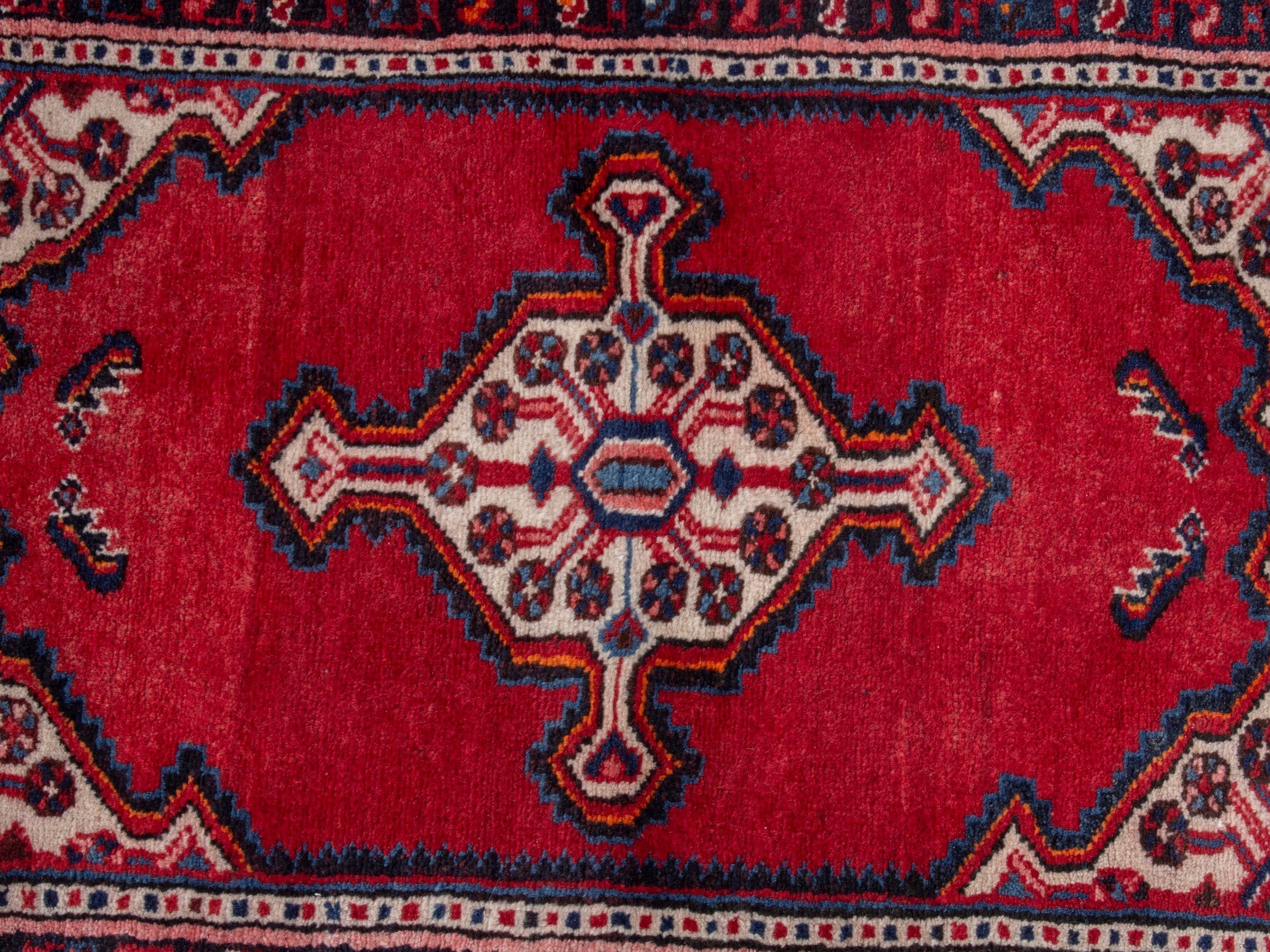 Persian Hamedan accent rug in deep red and navy, view 6 of 7