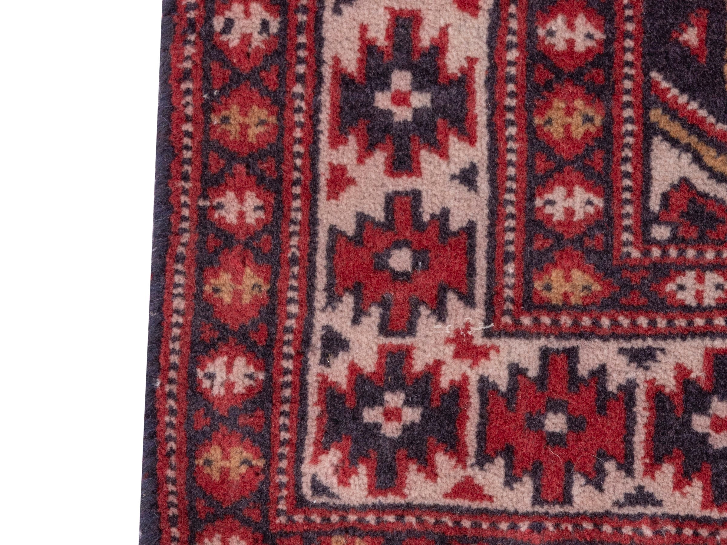 Persian Torkaman accent rug in deep red and burgundy, view 4 of 7