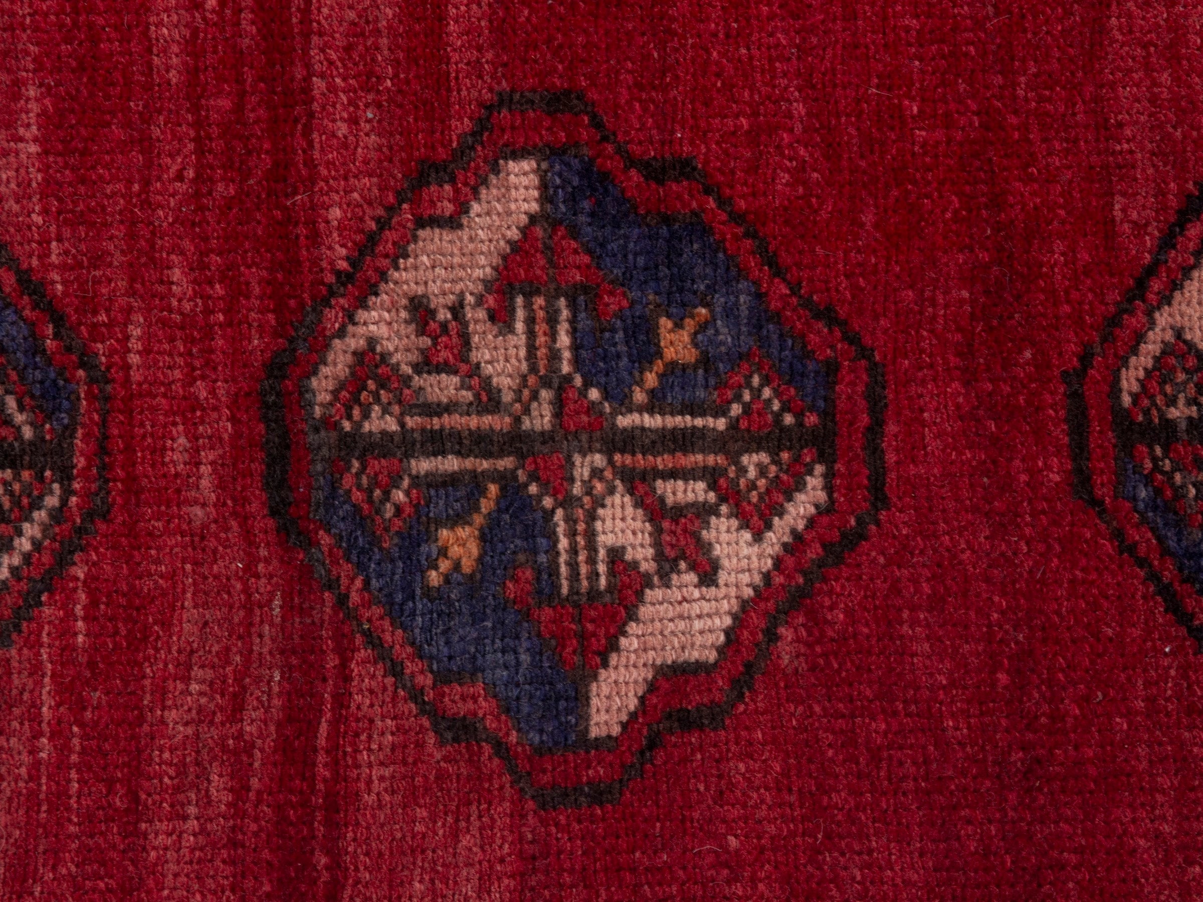 Persian Torkaman accent rug in deep red and dark blue, view 6 of 7