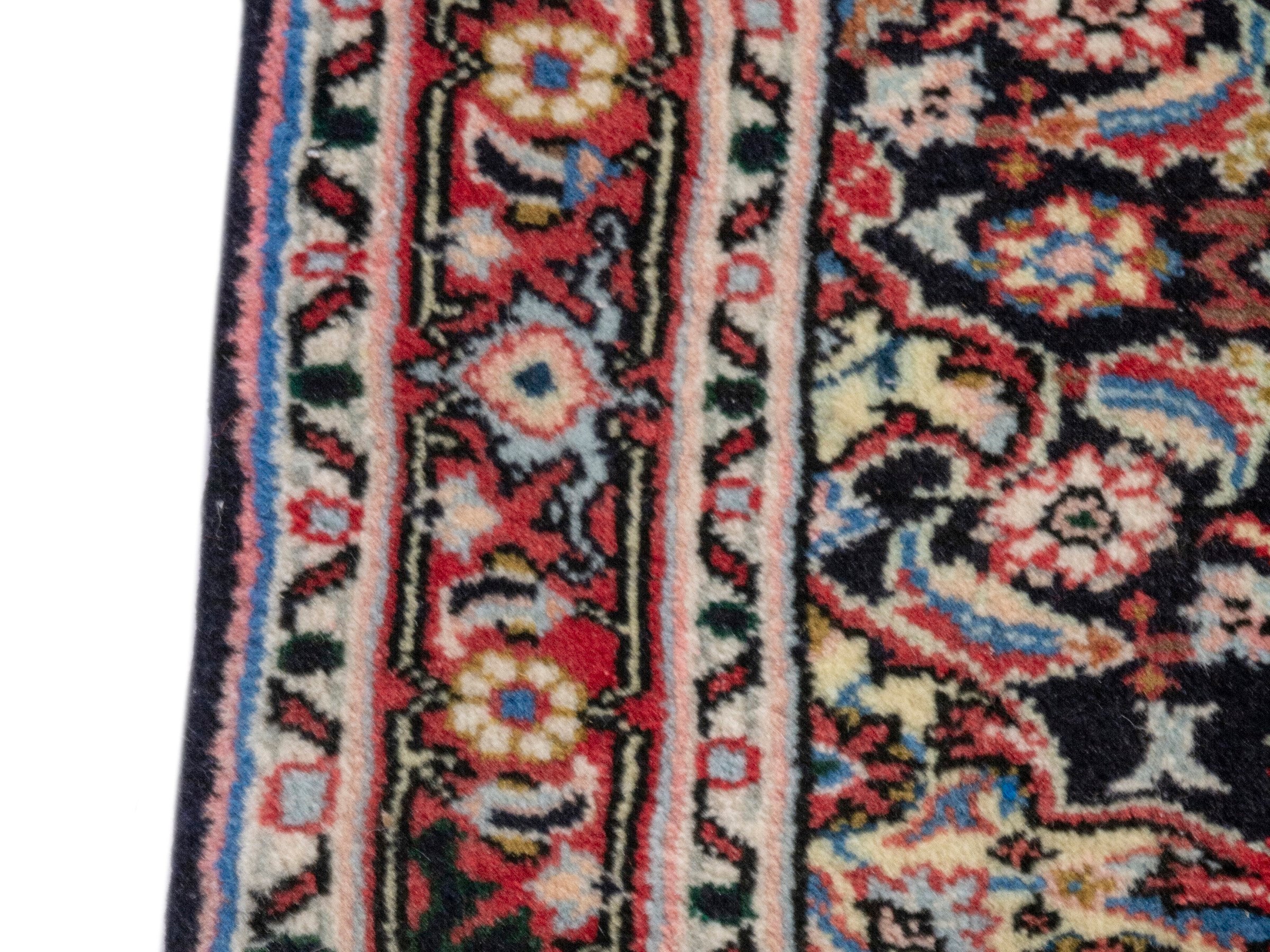 Persian Hamedan accent rug in navy and deep red, view 4 of 7