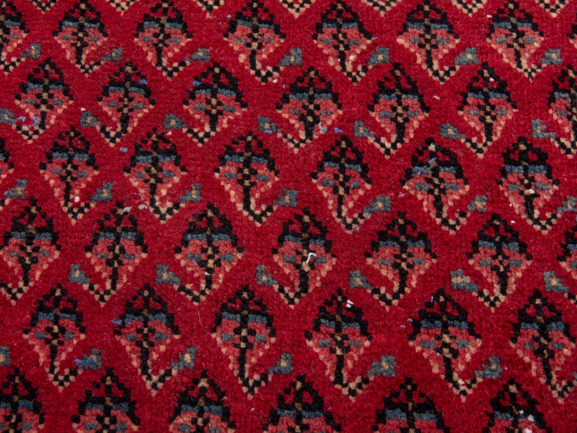 Persian Arak accent rug in burgundy and deep red, view 6 of 7