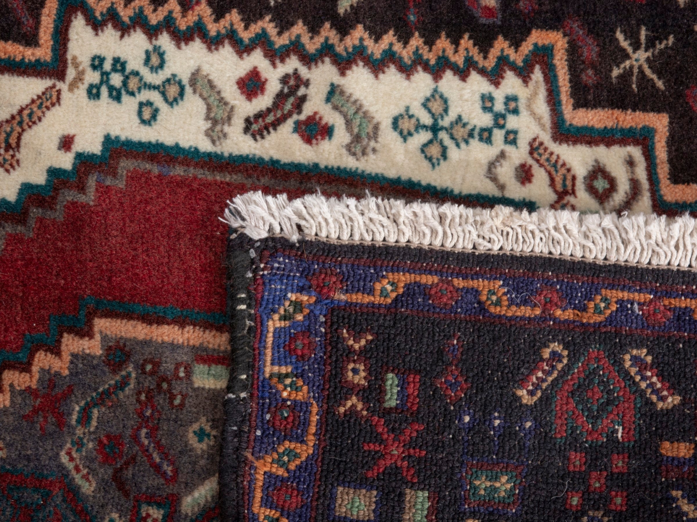 Persian Sanandaj accent rug in deep red and dark brown, view 7 of 7