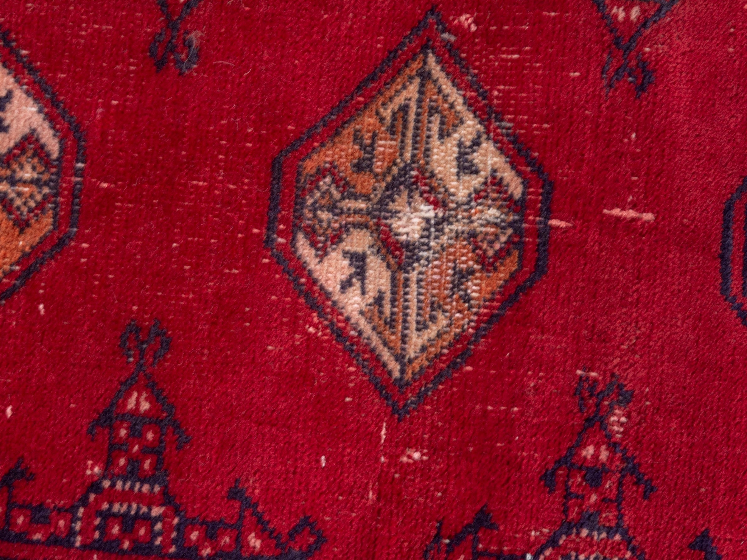 Persian Torkaman accent rug in deep red and burgundy, view 6 of 7