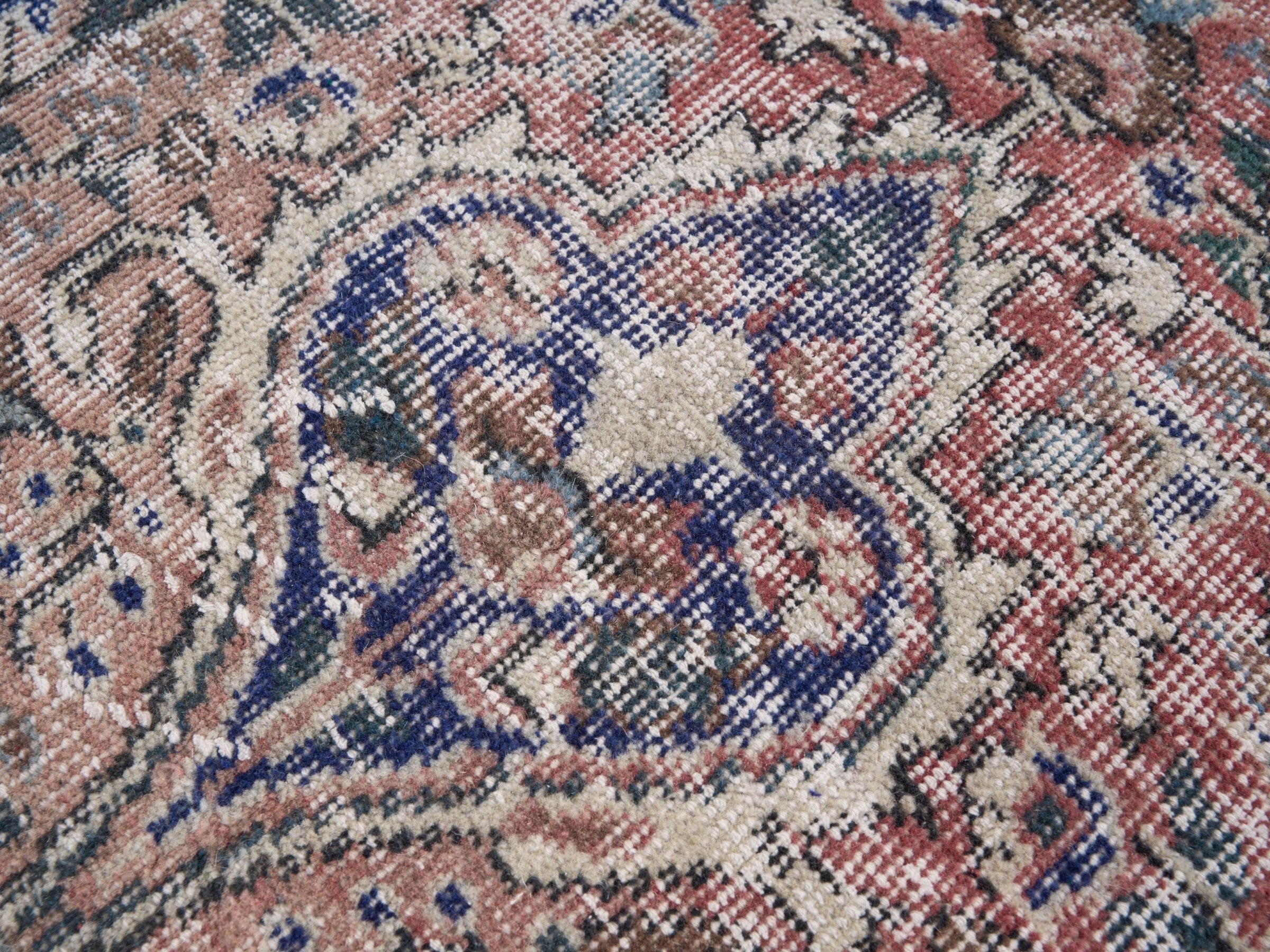 Turkish Isparta area rug in terracotta and navy, view 7 of 10
