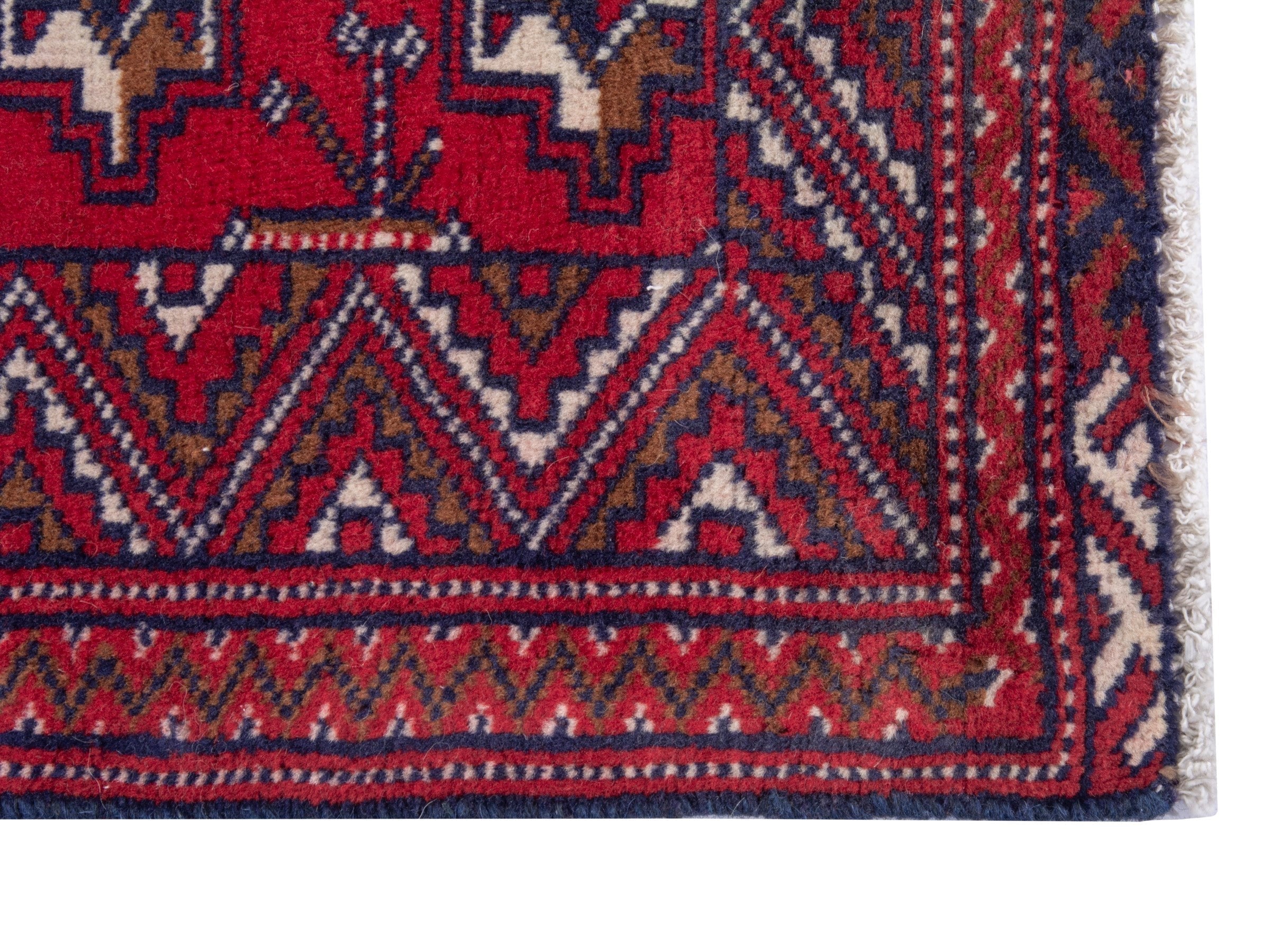 Persian Torkaman accent rug in deep red and off-white, view 4 of 8