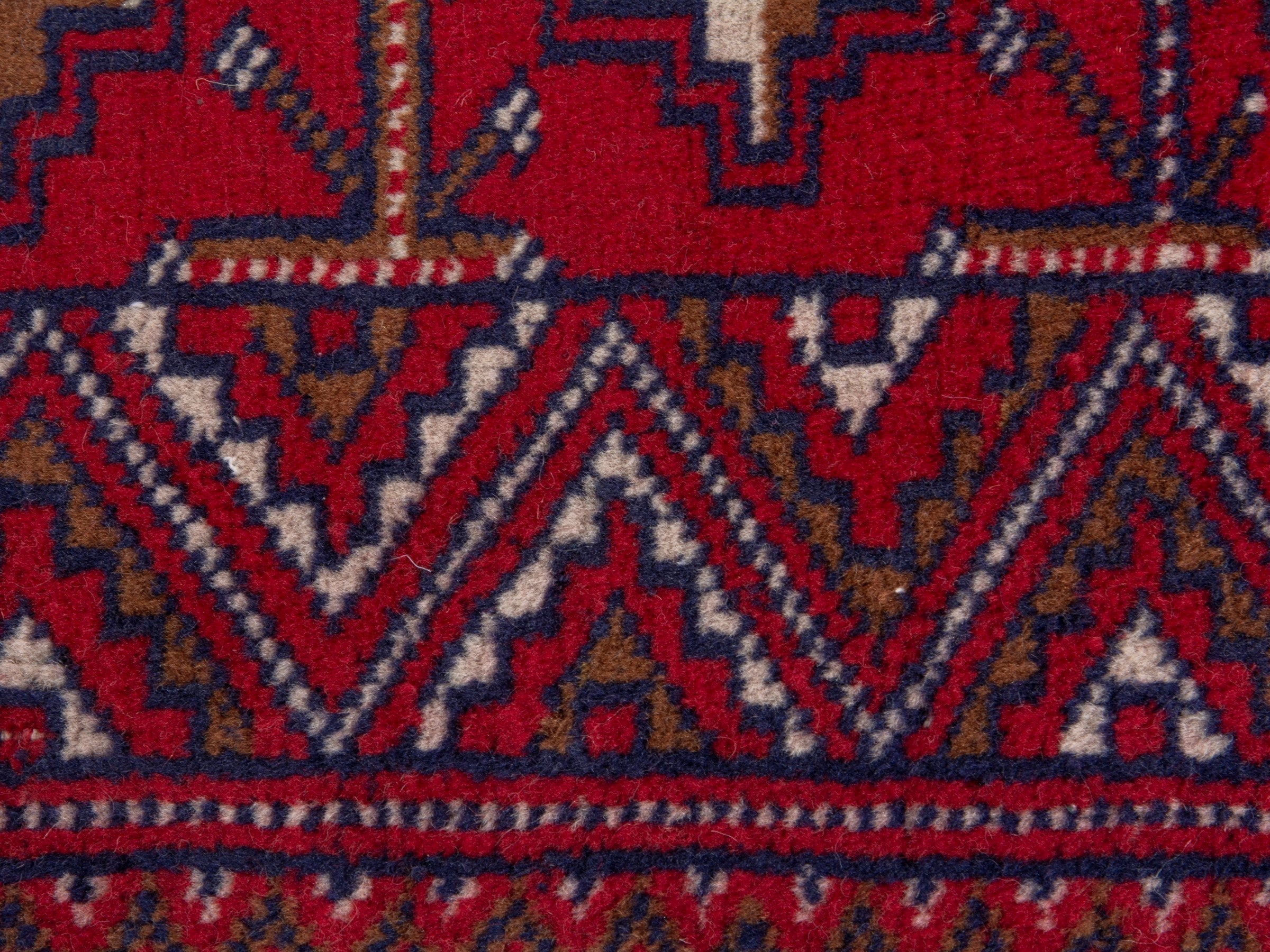 Persian Torkaman accent rug in deep red and off-white, view 6 of 8