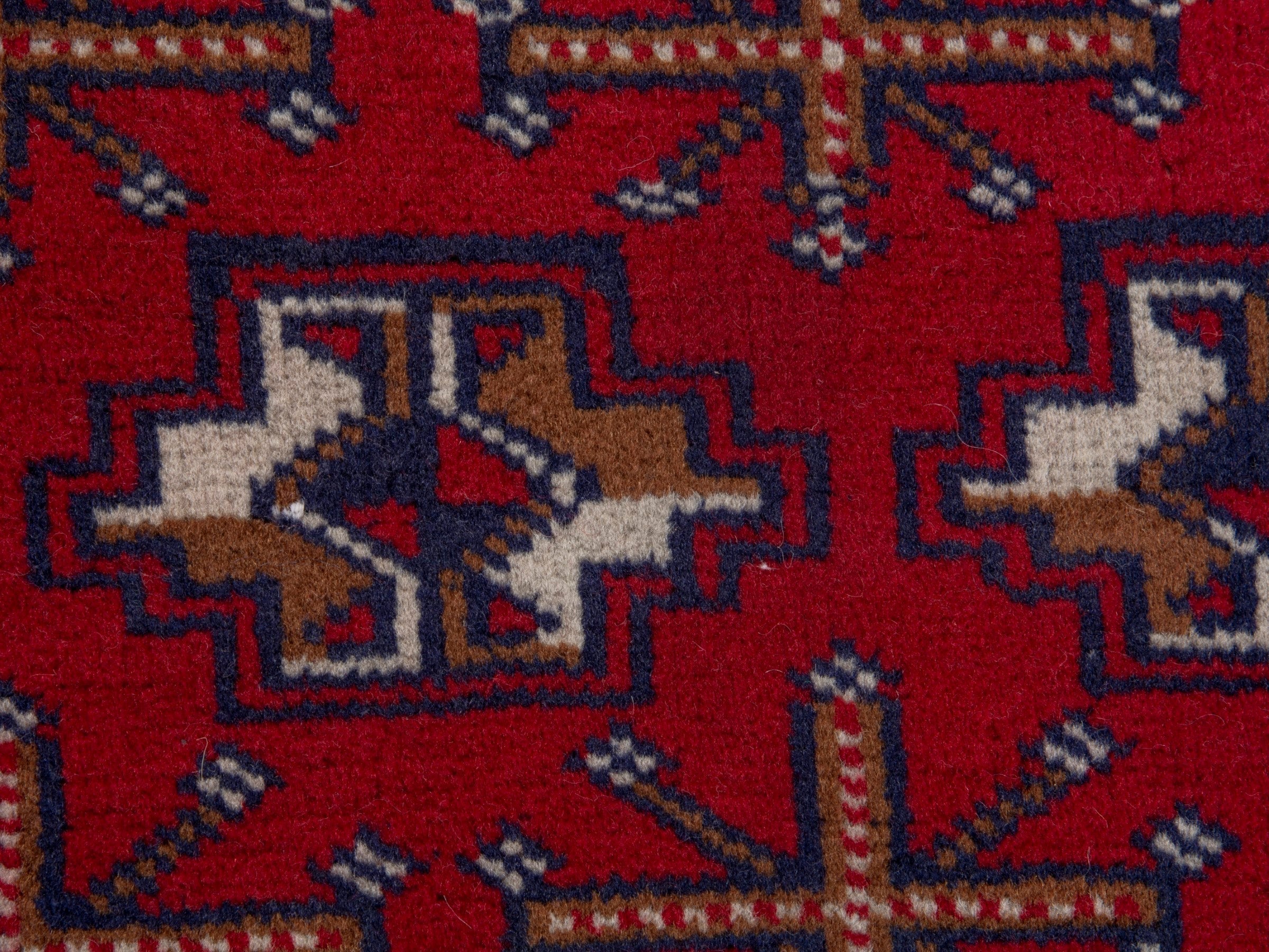 Persian Torkaman accent rug in deep red and off-white, view 7 of 8