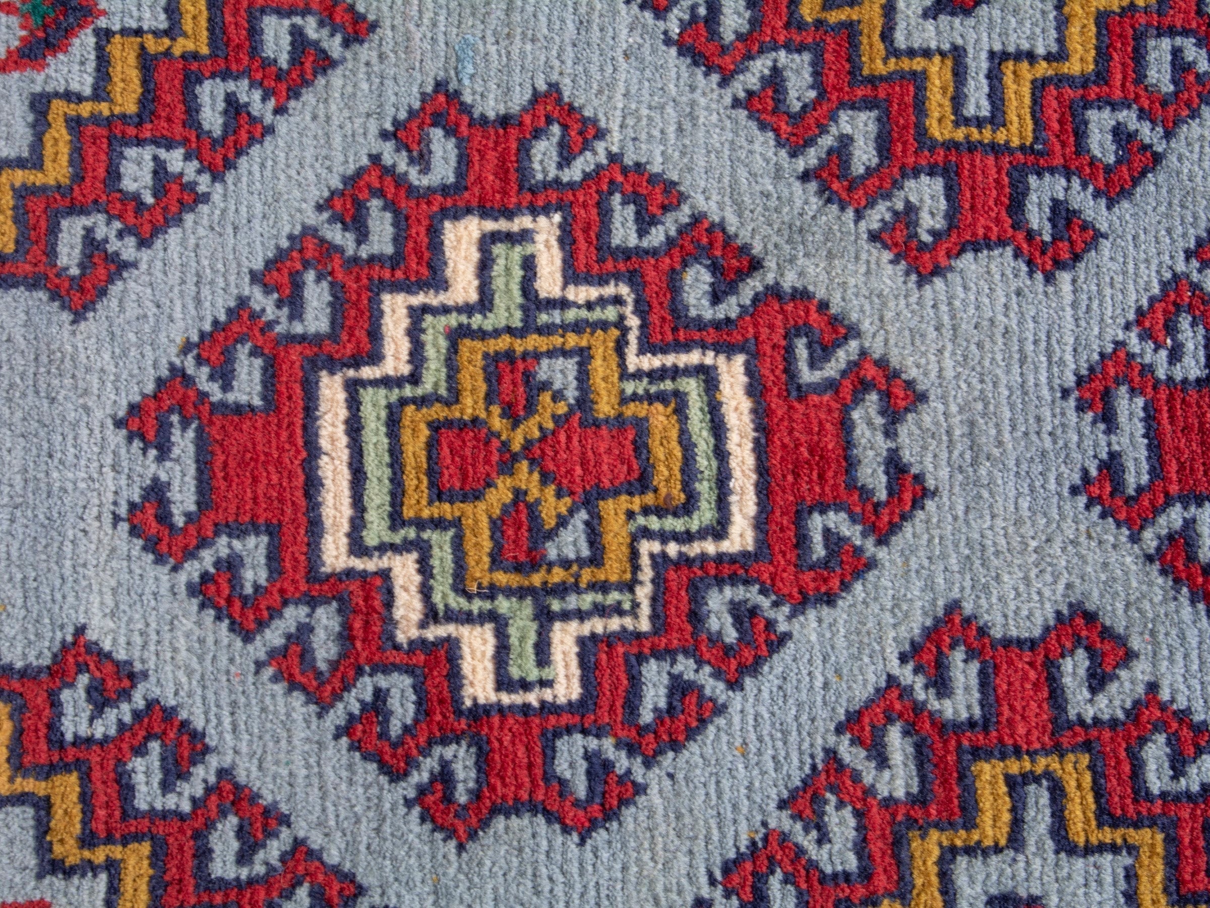 Persian Torkaman accent rug in deep red and powder blue, view 6 of 7